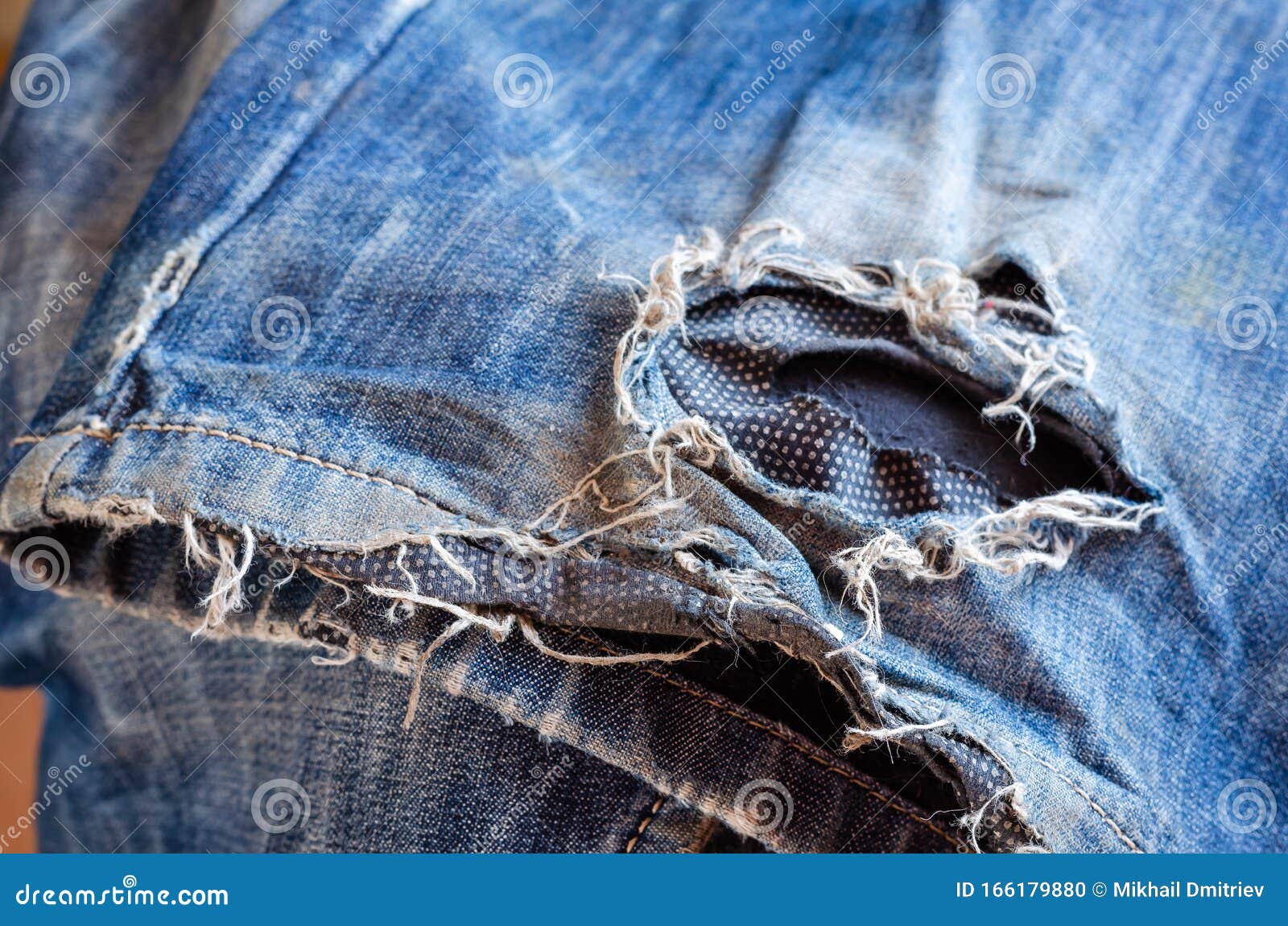 bottom torn jeans
