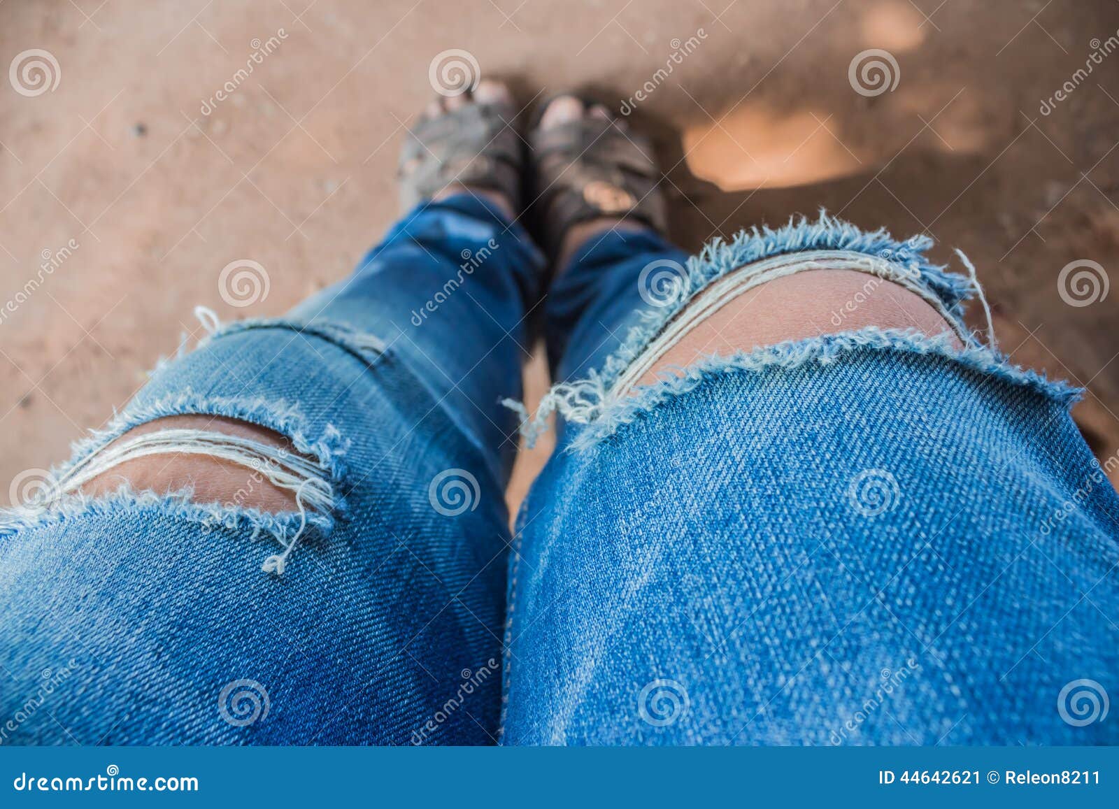 Torn jeans stock image. Image of slim, bench, torn, sneakers 44642621