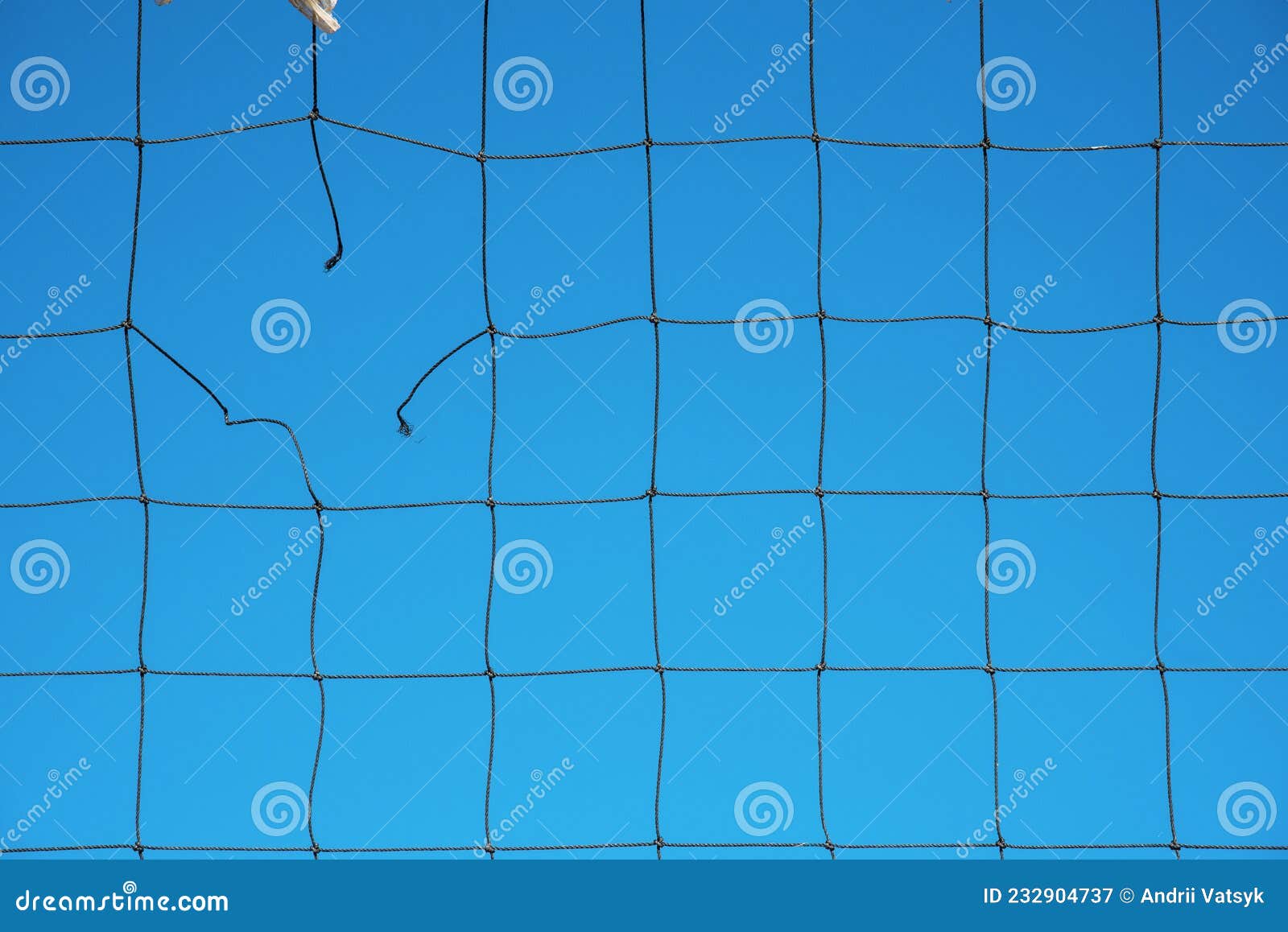 Torn Volleyball Net on Sky Background Failure, Loss, Breakdown