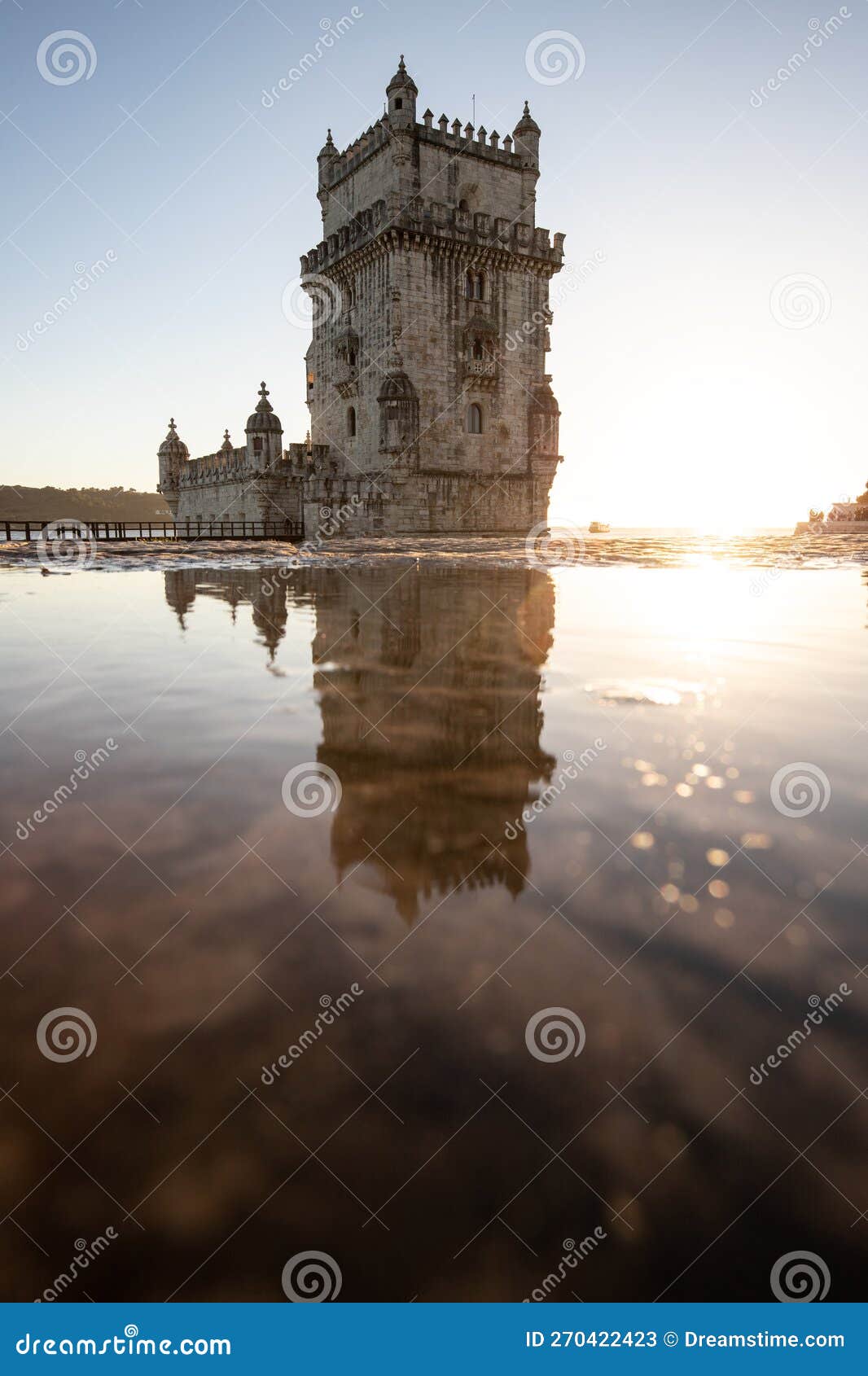 torre de belÃ©m on the banks of the tagus, historic watchtower in the sunset