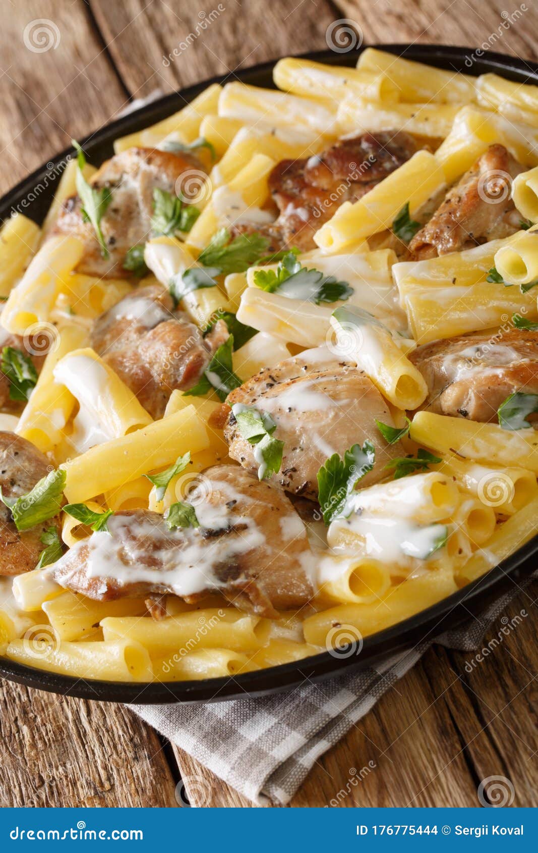 Tortiglioni Pasta with Chicken in a Creamy Sauce Close-up in a Plate ...