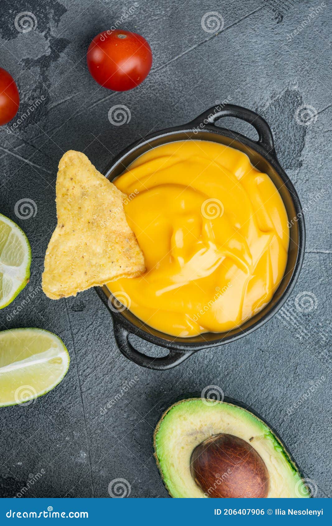 Tortilla Chips with Cheese Dip, on Gray Background, Top View or Flat