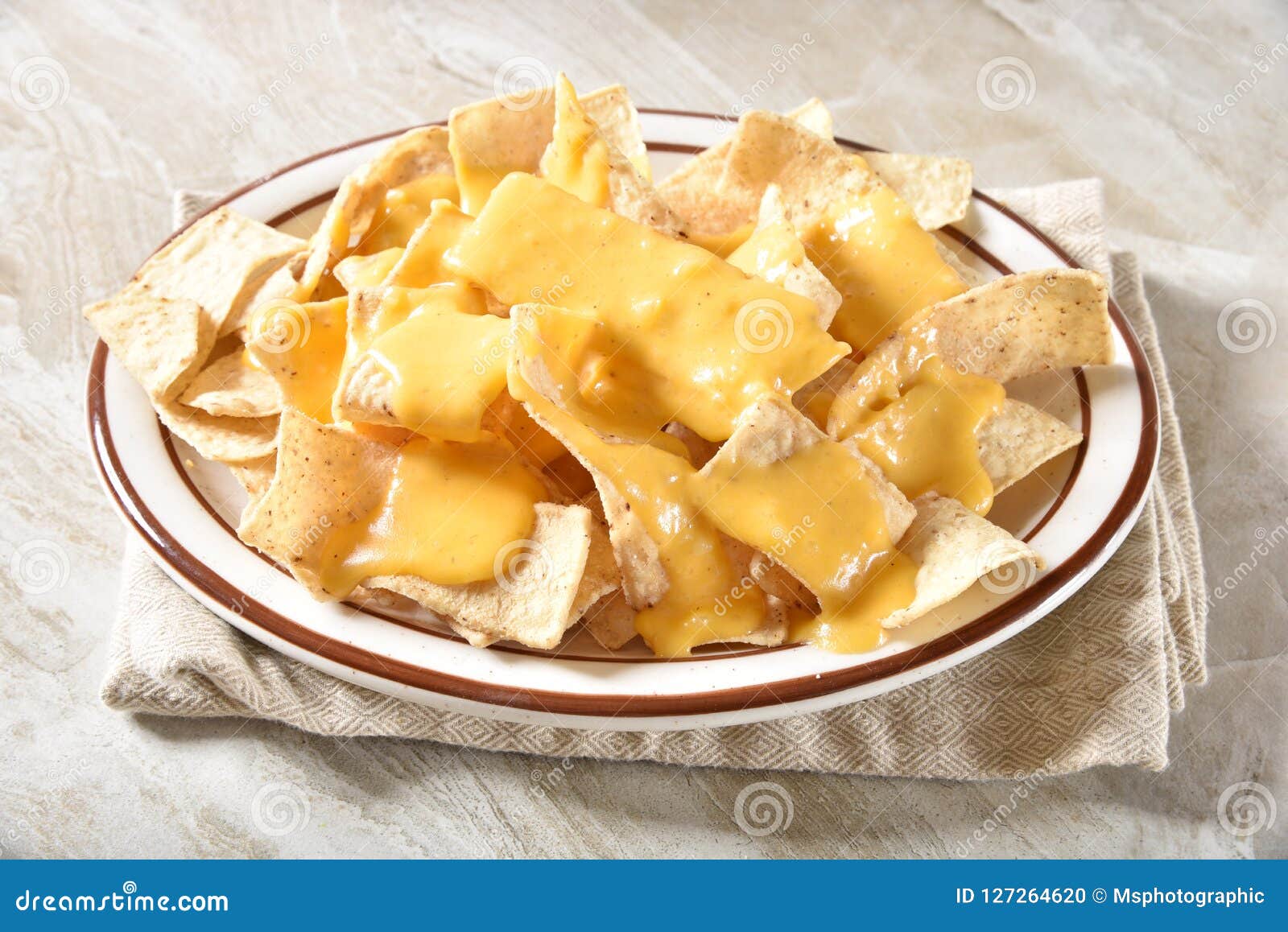Tortilla Chips with Cheese Sauce Stock Photo Image of salty, queso