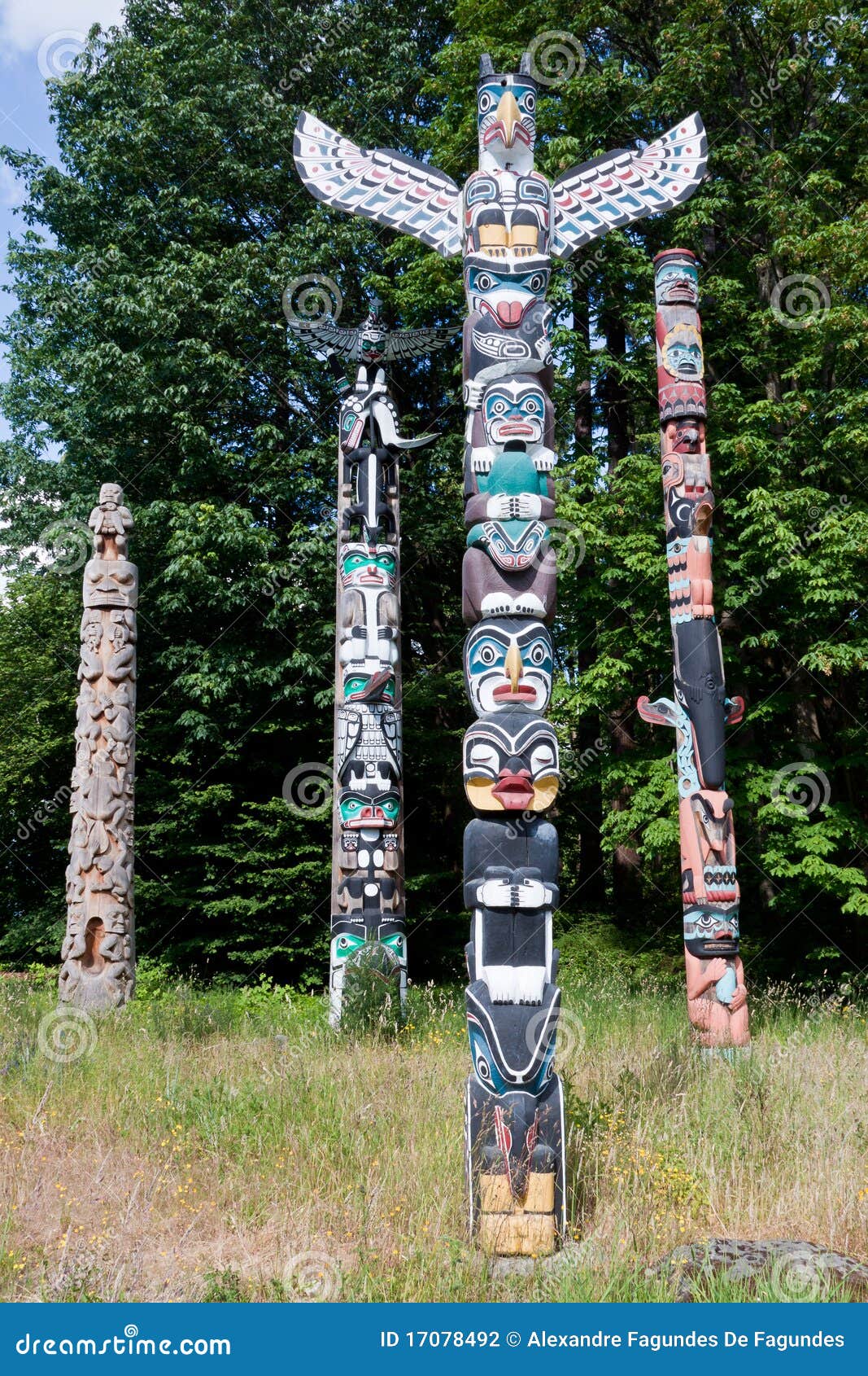 Totem Poles in Stanley Park. 8 colorful wood totem poles at Stanley Park, Vancouver, Canada.