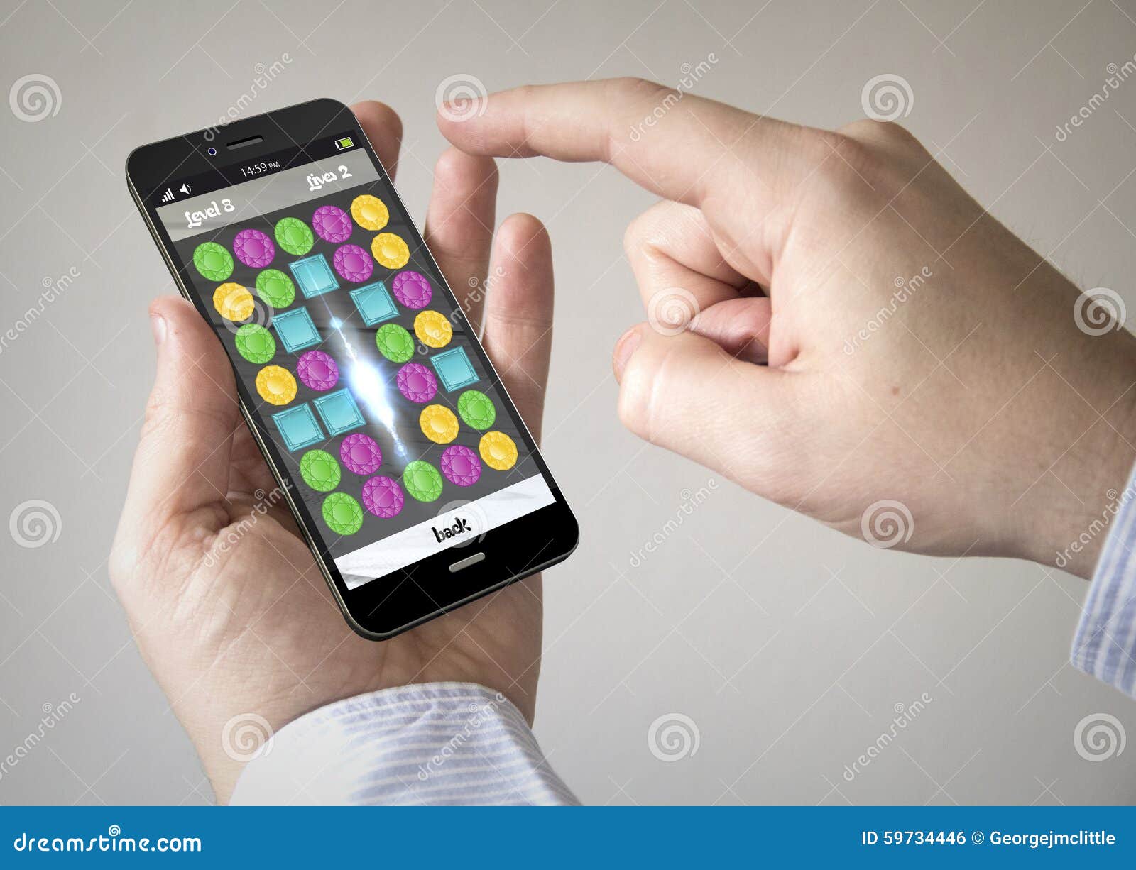 touchscreen smartphone with puzzle game on the screen