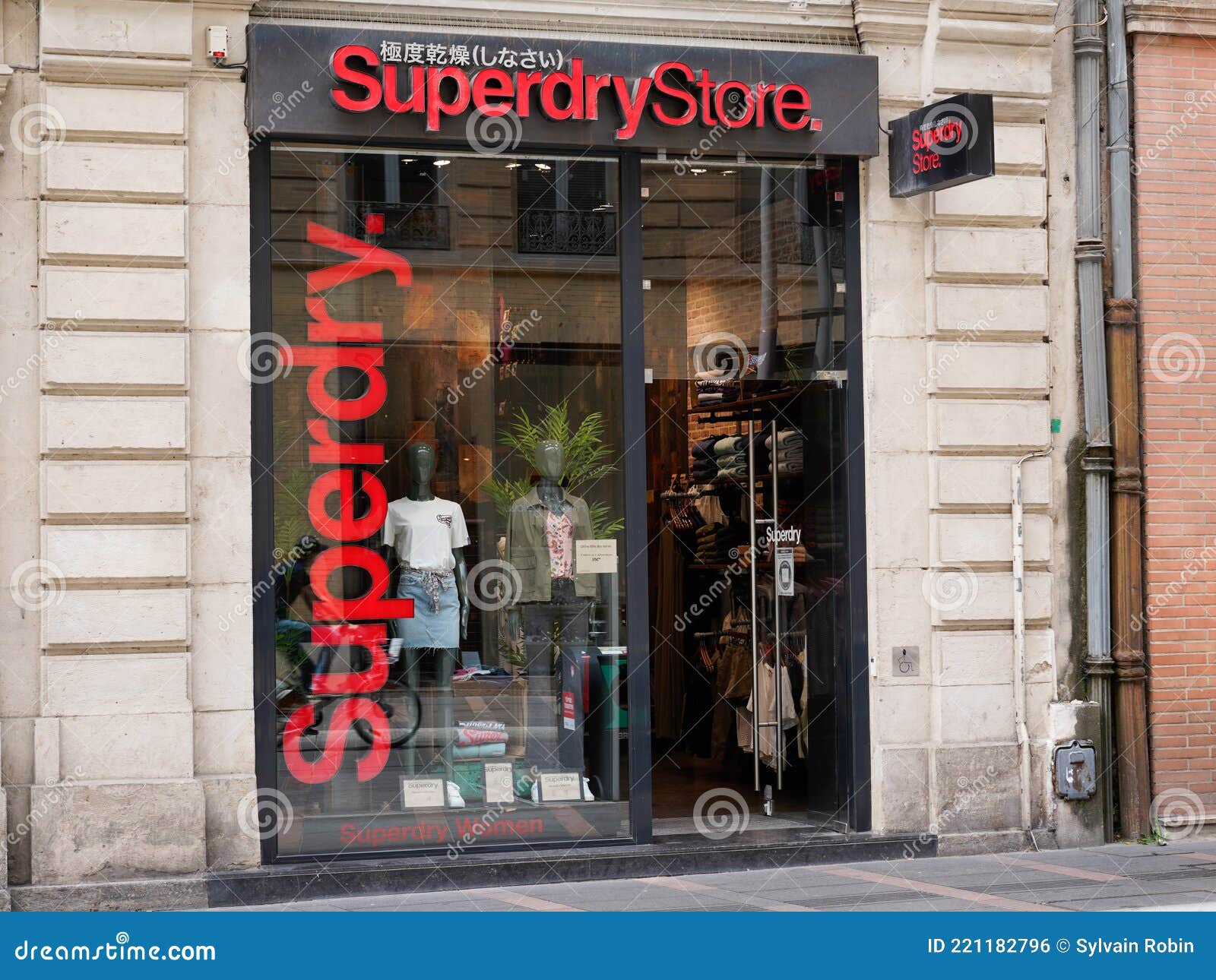 Superdry Logo Brand Fashion Shop and Text Sign Store on Facade