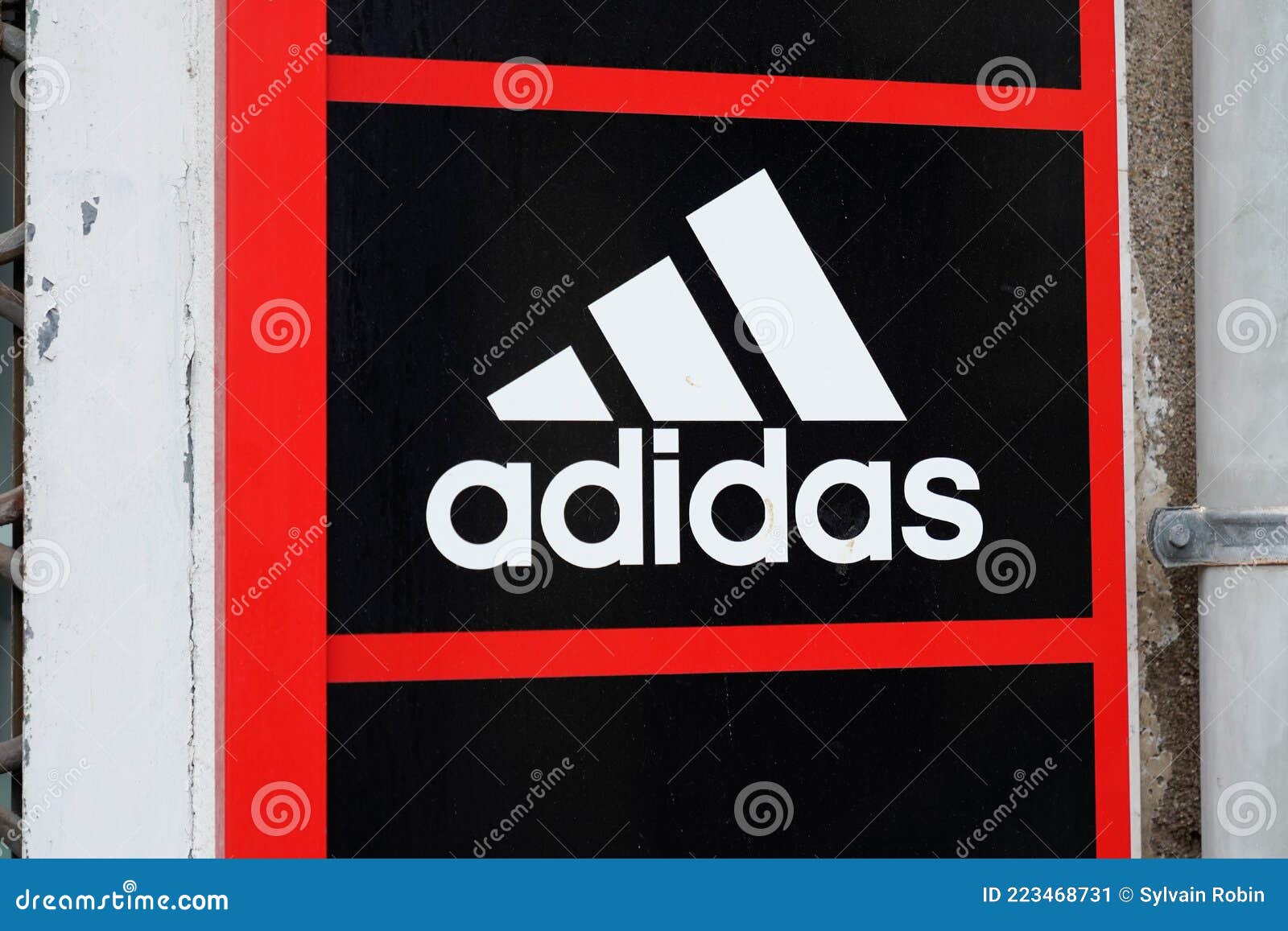 Adidas Logo Brand and Text Sign on Store of Sporty Multinational Corporation Editorial Photo of brand, icon: 223468731