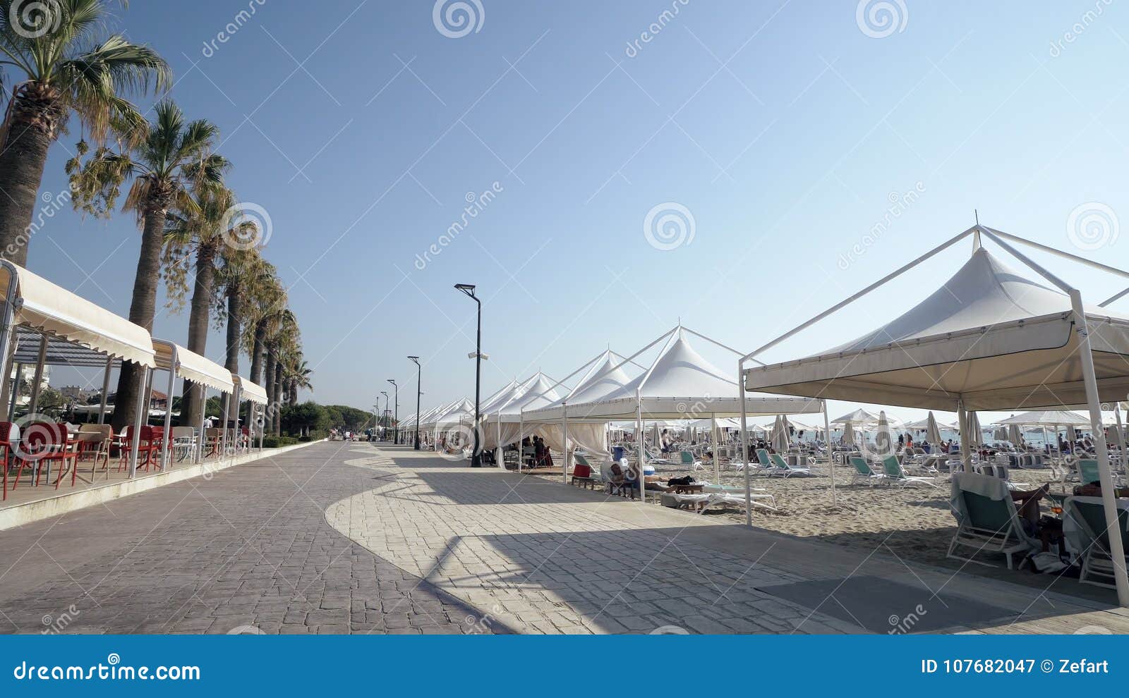 touris walk pov on promenade seafront