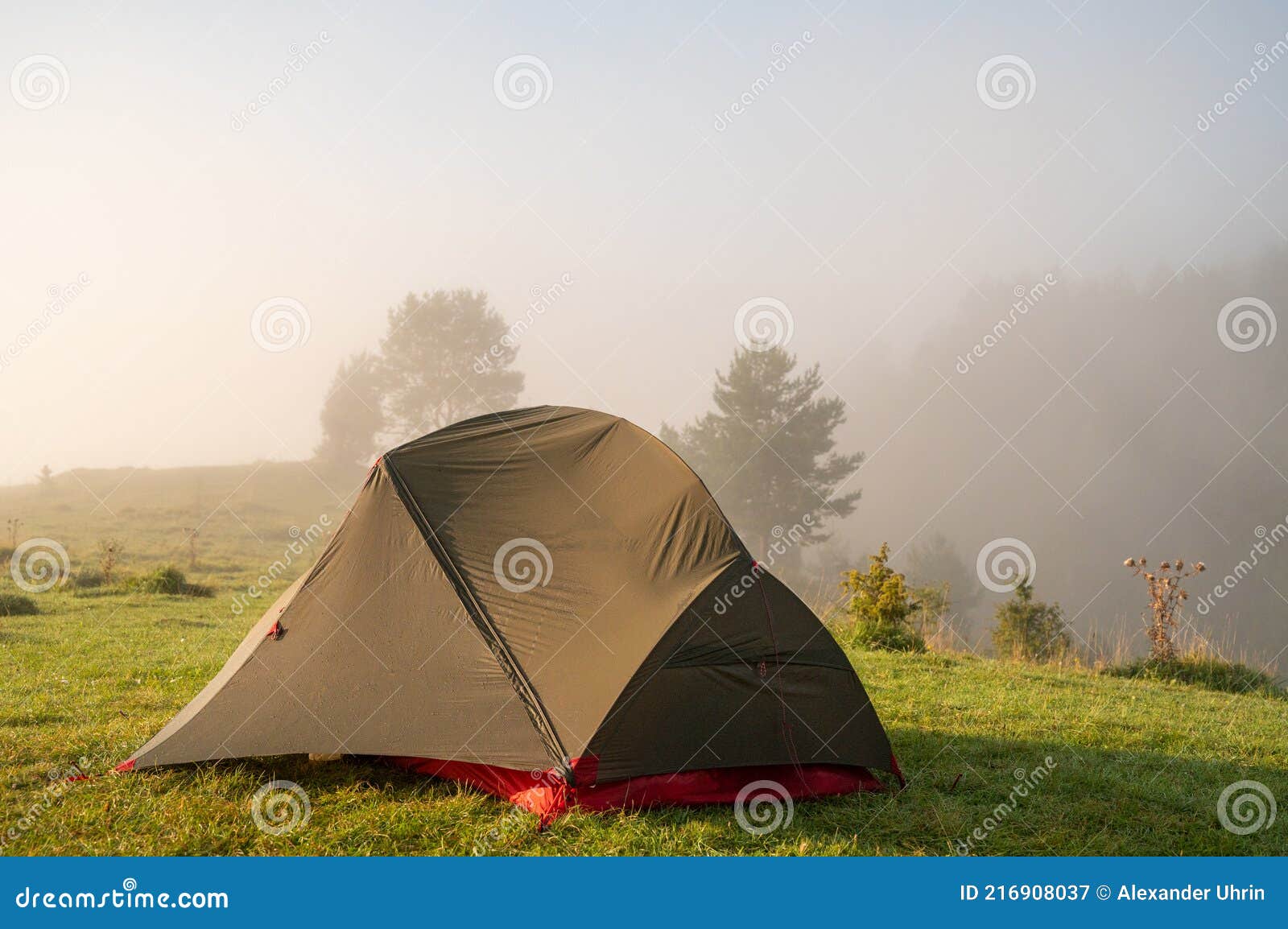 Tourist Camping Tent in a Mountains. Family Adventure Camping. Stock ...