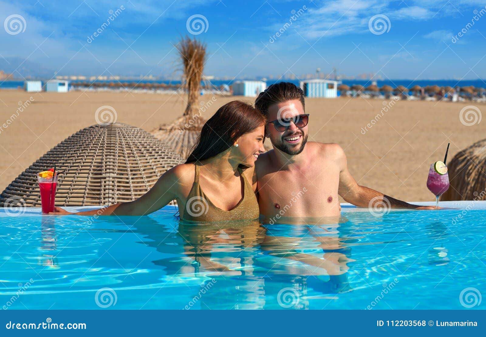 Tourist Couple Having Bath In Infinity Pool Stock Photo Image