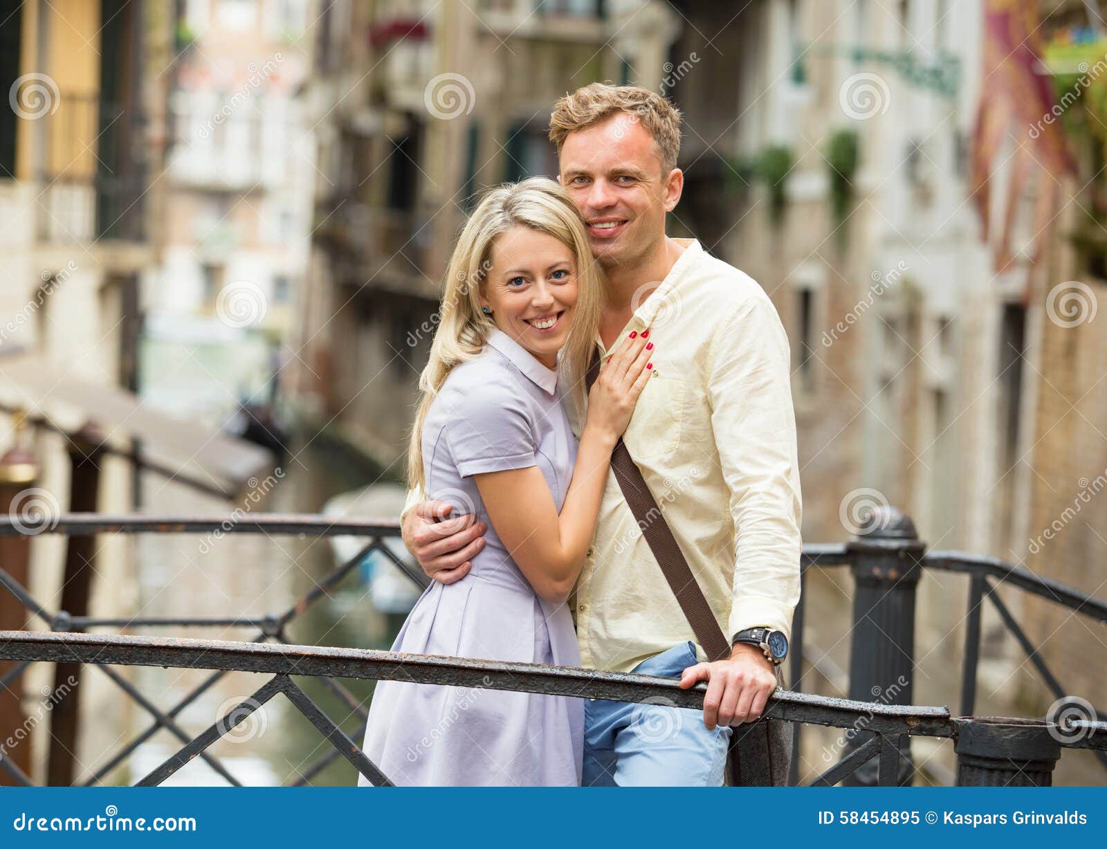 Tourist couple in Venice stock image. Image of bridge 58454895