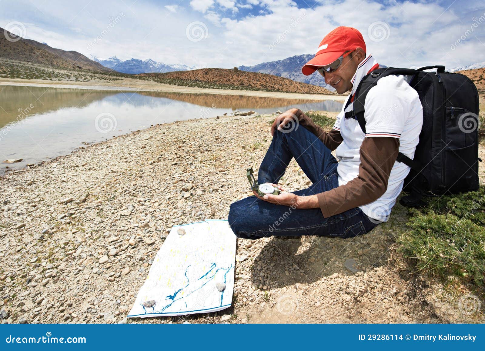 Tourist Hiker with Compass and Map in Mountains Stock Photo Image of