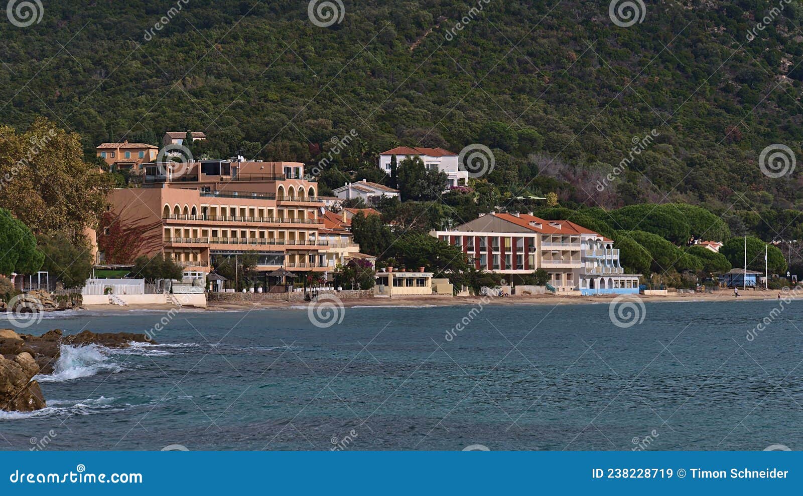 tourist hotels on the shore near le lavandou at the french riviera on sunny day in autumn viewed from beach plage du layet.