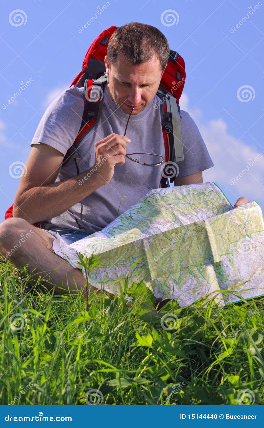 Tourist looking on map stock photo. Image of summer, backpack - 15144440