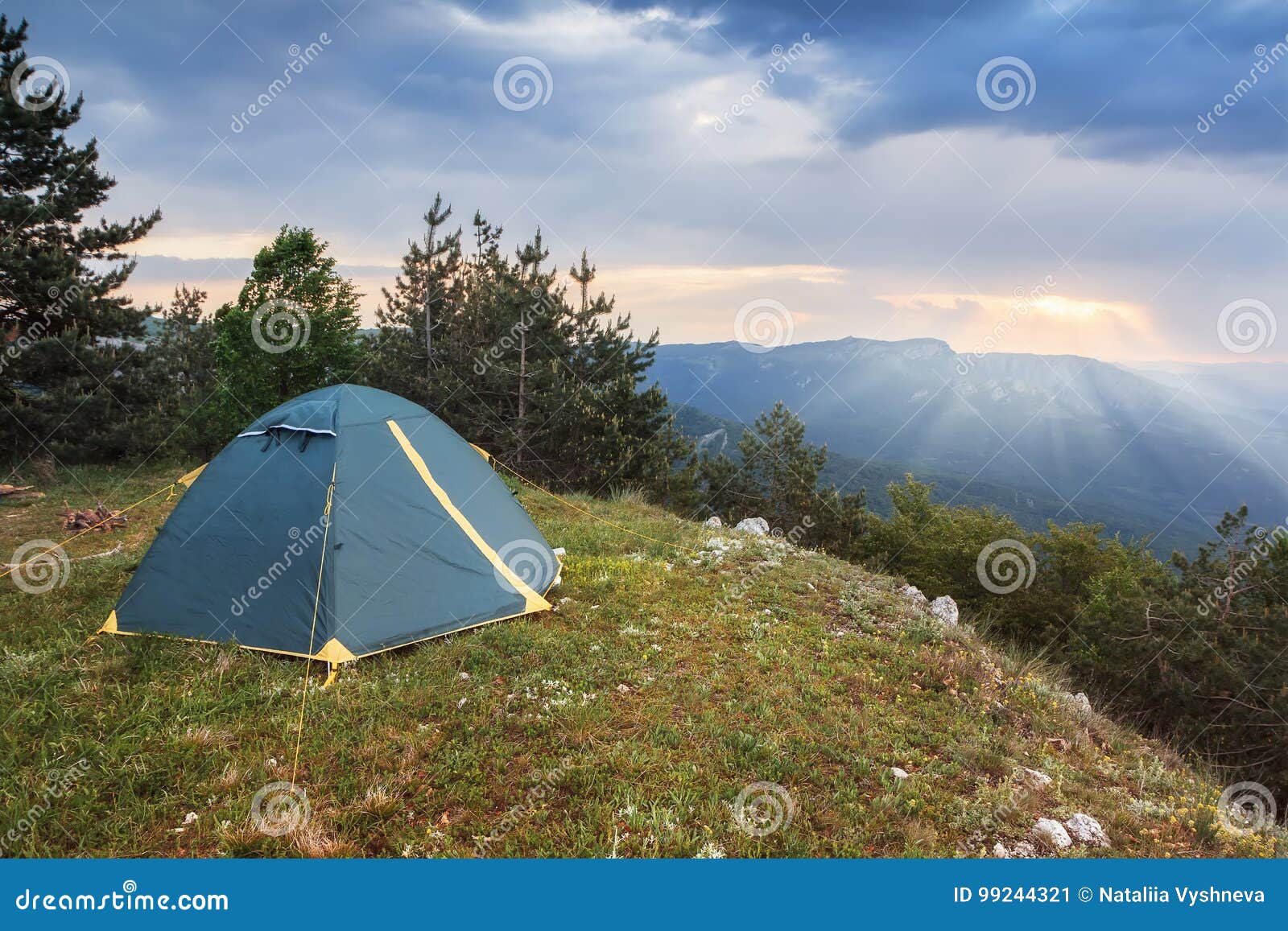 Tourist Tent in the Camping at the Top of the Mountain at Dawn Stock
