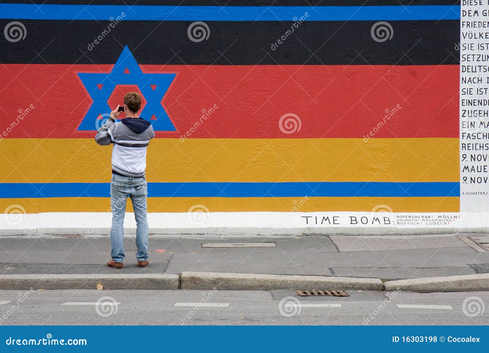 Tourist Visiting the New Designed Berlin Wall Editorial Stock Photo