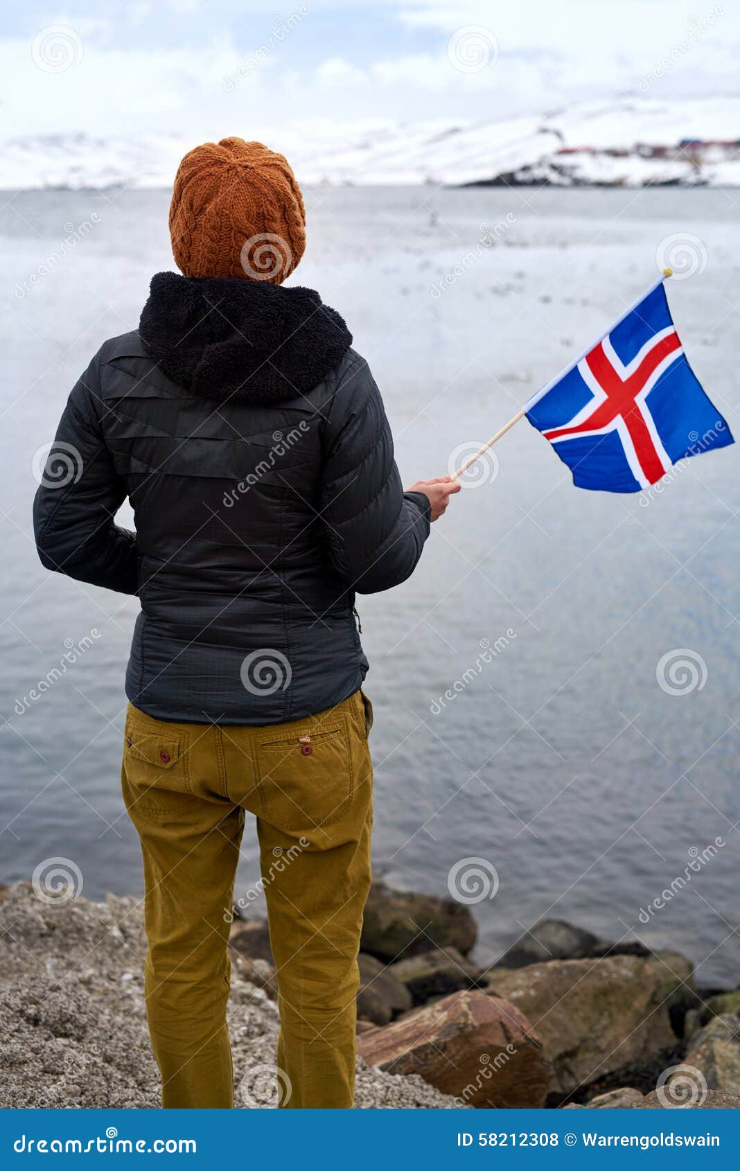 Tourist Waving Iceland Flag Stock Photo - Image of view, mountains ...