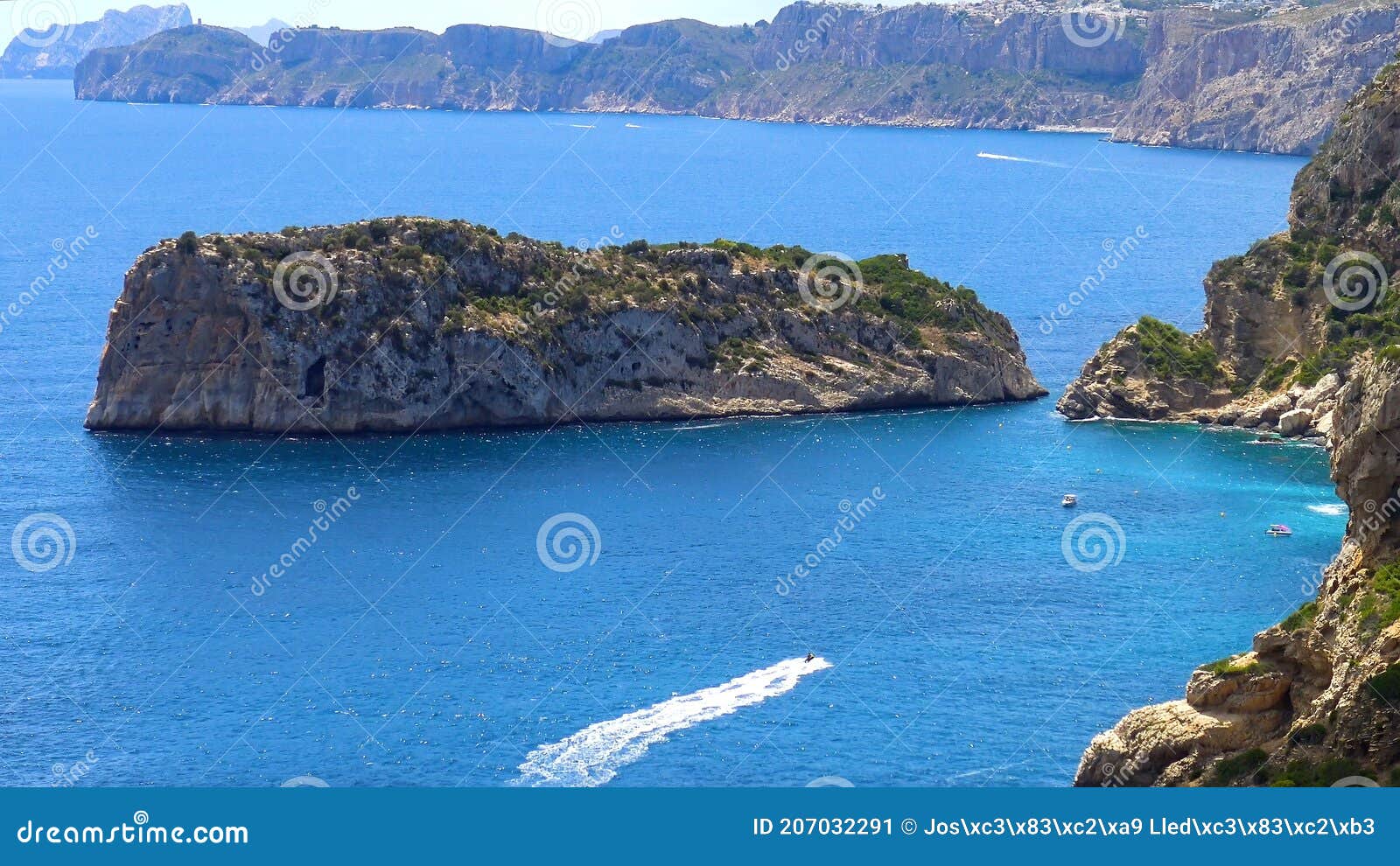aerial view of the coastline of javea with the little descubridor islet.