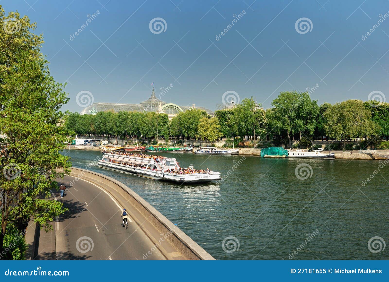 Tourists on boat in Paris, France