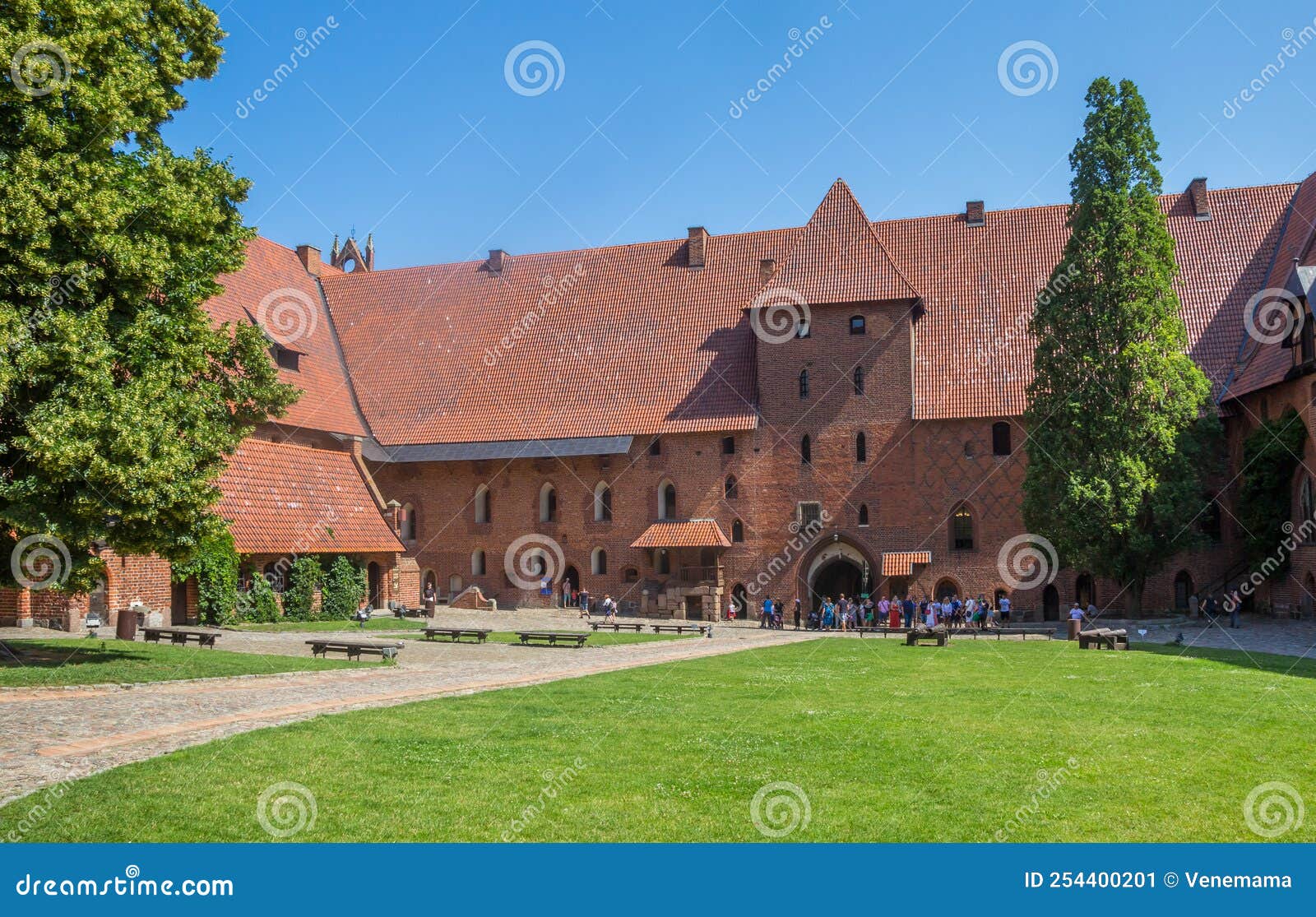 Tourists in the Courtyard of the Historic Castle of Malbork Editorial ...