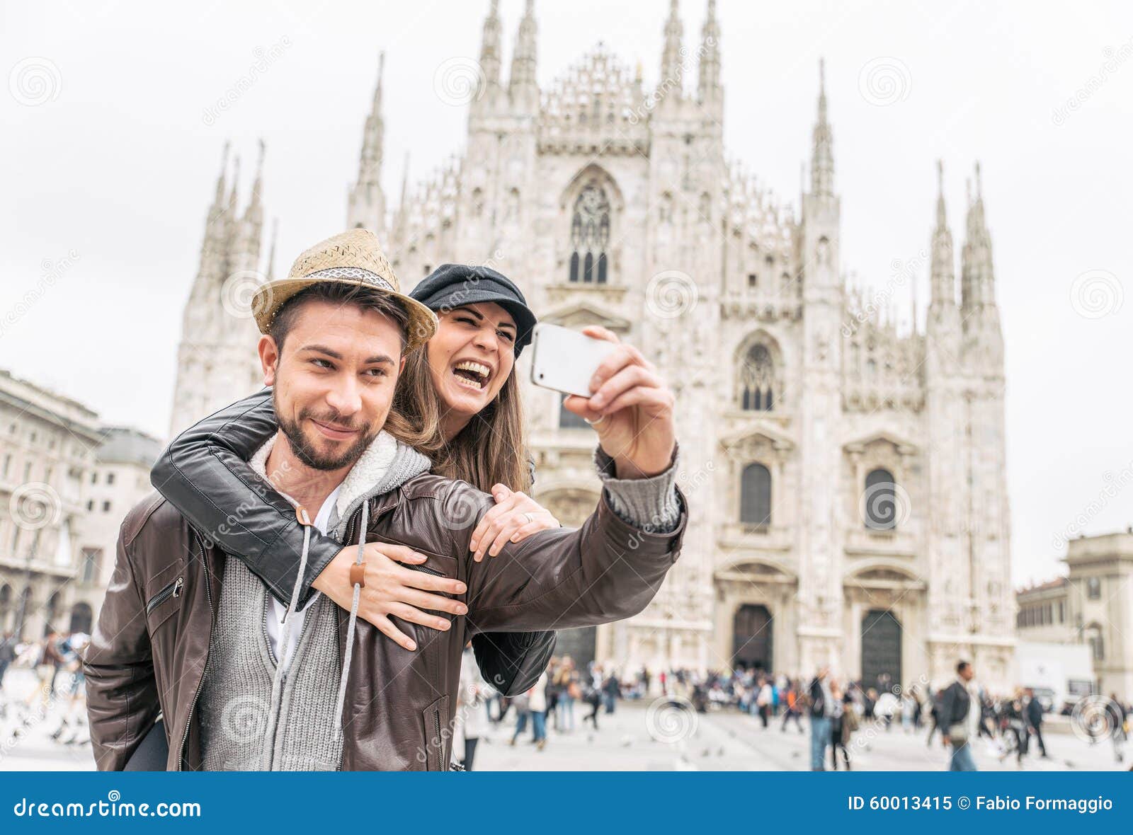 tourists at duomo cathedral,milan