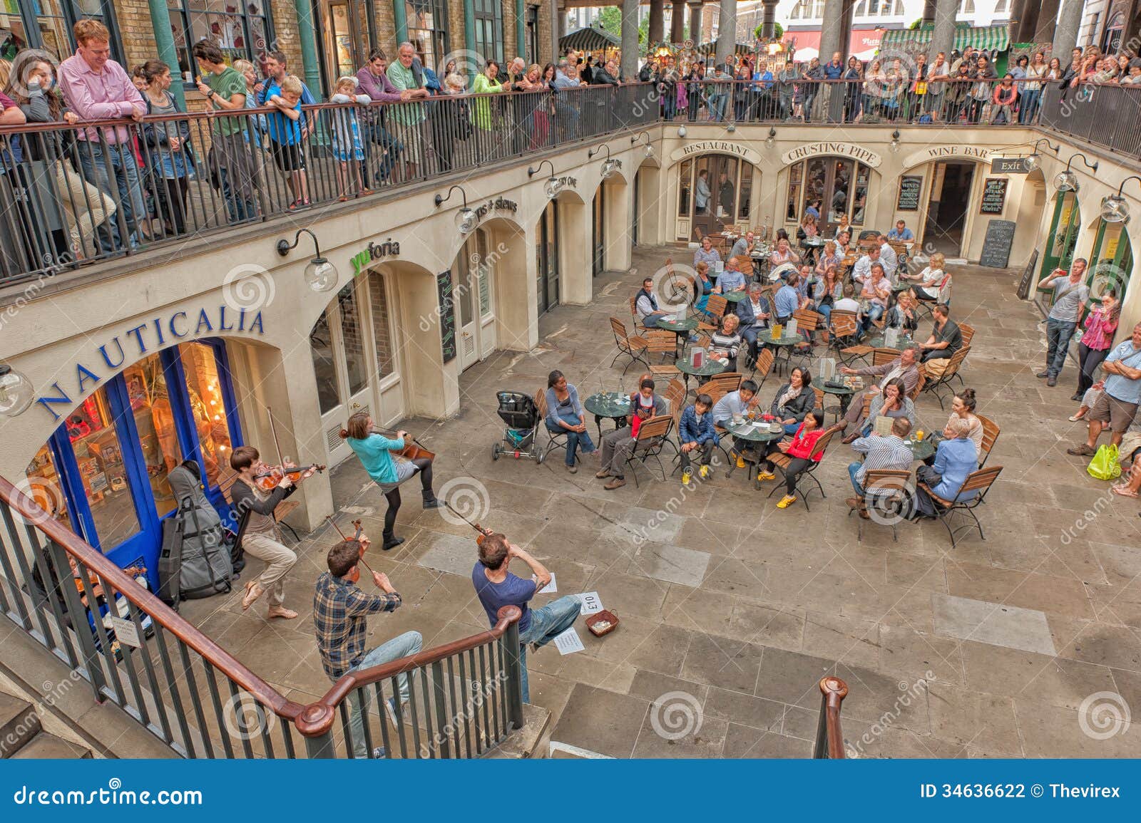 Tourists Listen To A Singer In Covent Garden Editorial Photography Image Of Architecture Garden 34636622