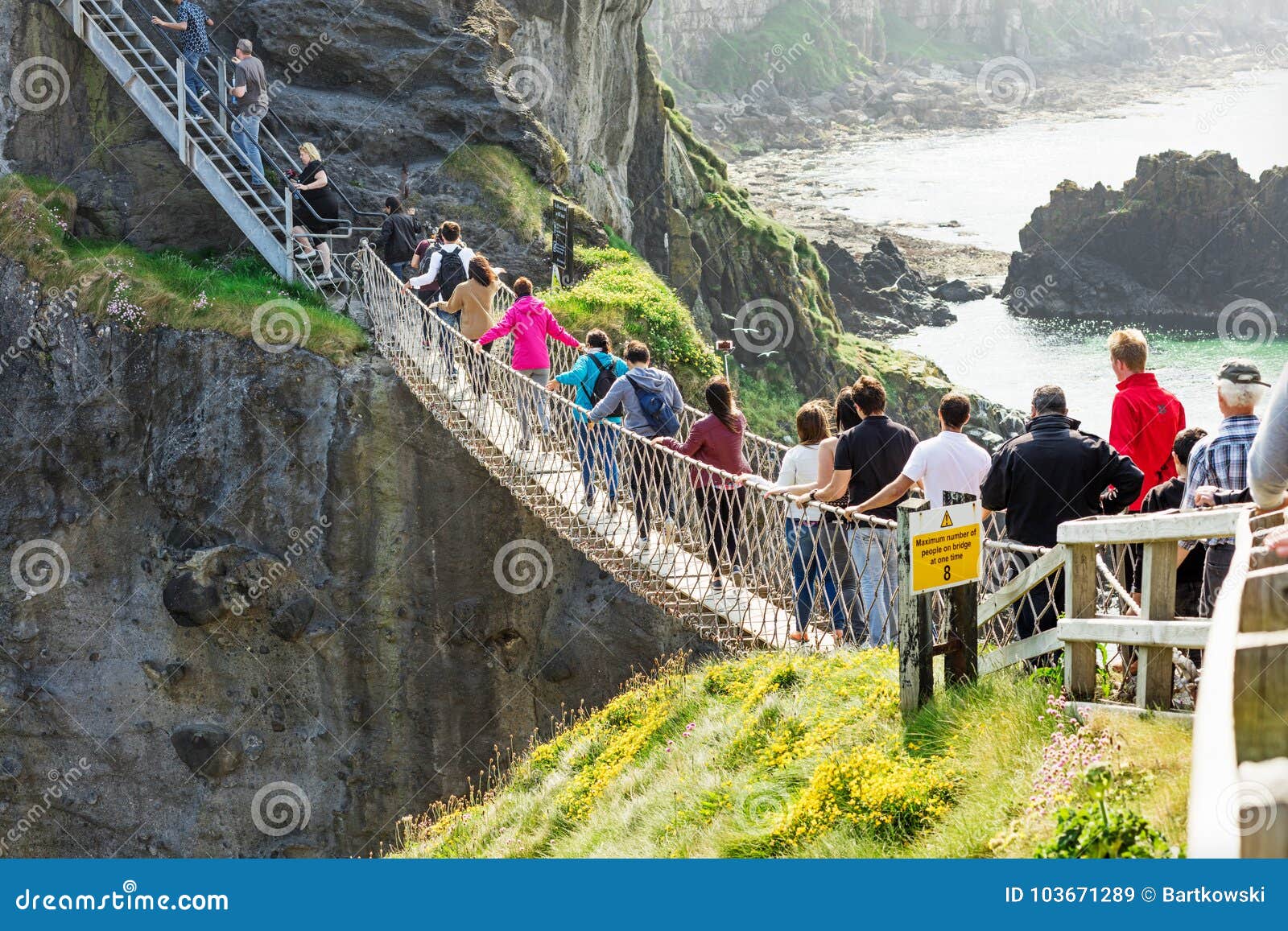 Tourists Visiting Carrick-a-Rede Rope Bridge in County Antrim of