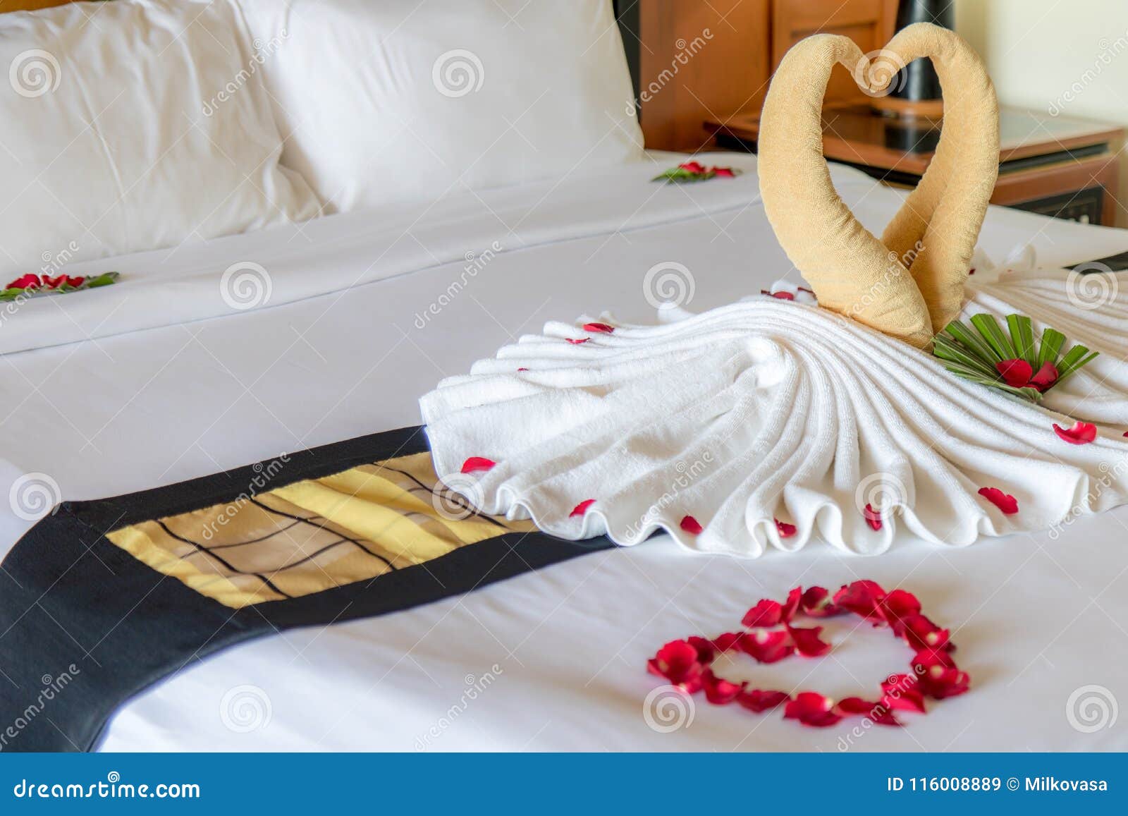Towel As Birds Decoration with Red Rose Petals Stock Image - Image ...
