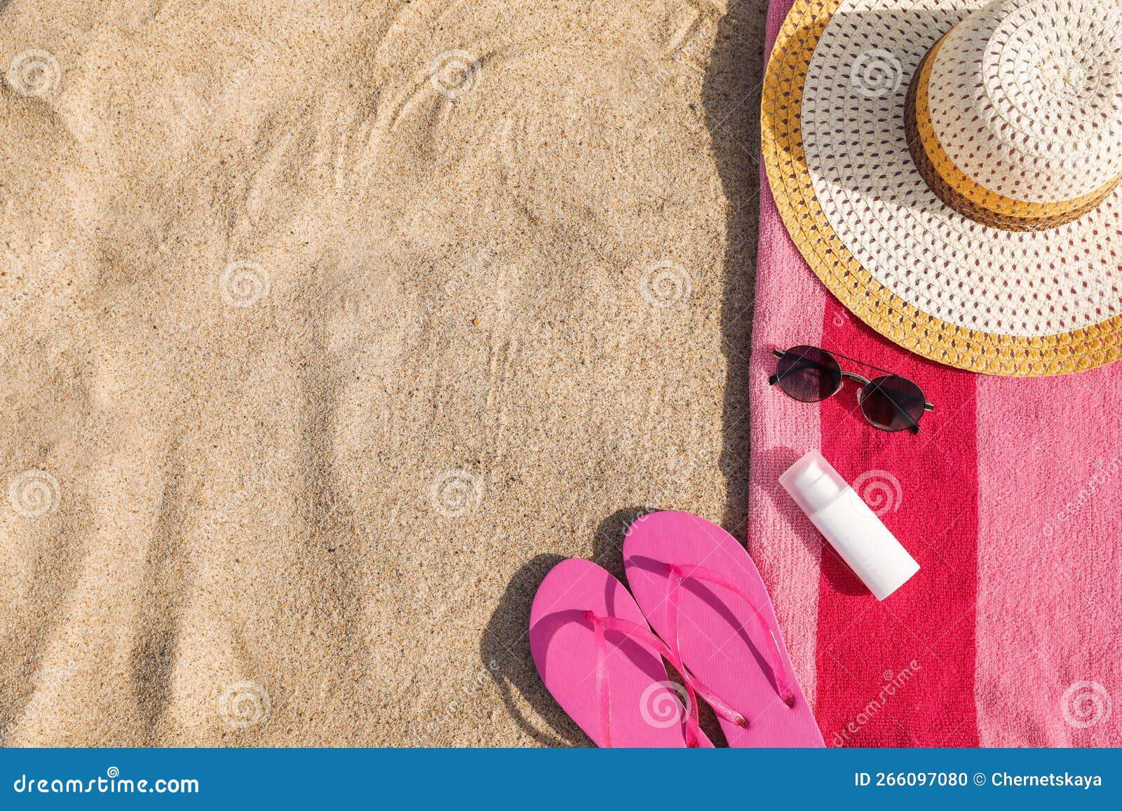 Towel and Beach Accessories on Sand, Flat Lay. Space for Text Stock ...