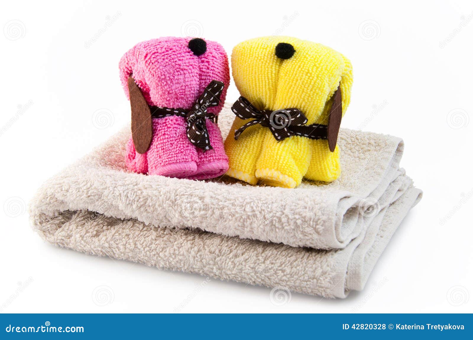 Towels in the form of dogs stock photo. Image of purity 42820328