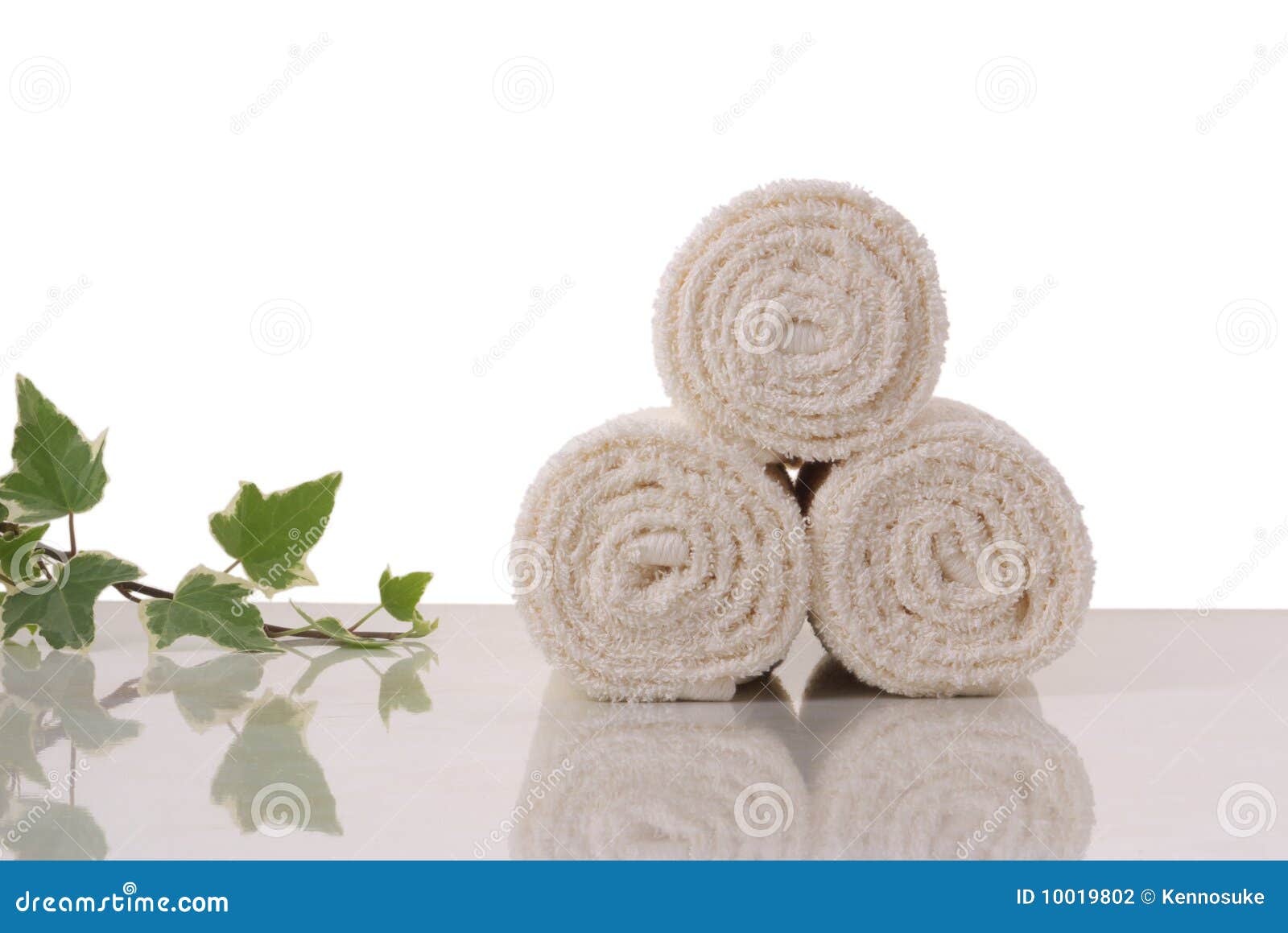 Towels rolls stock photo. Image of piling, green, bathroom 10019802