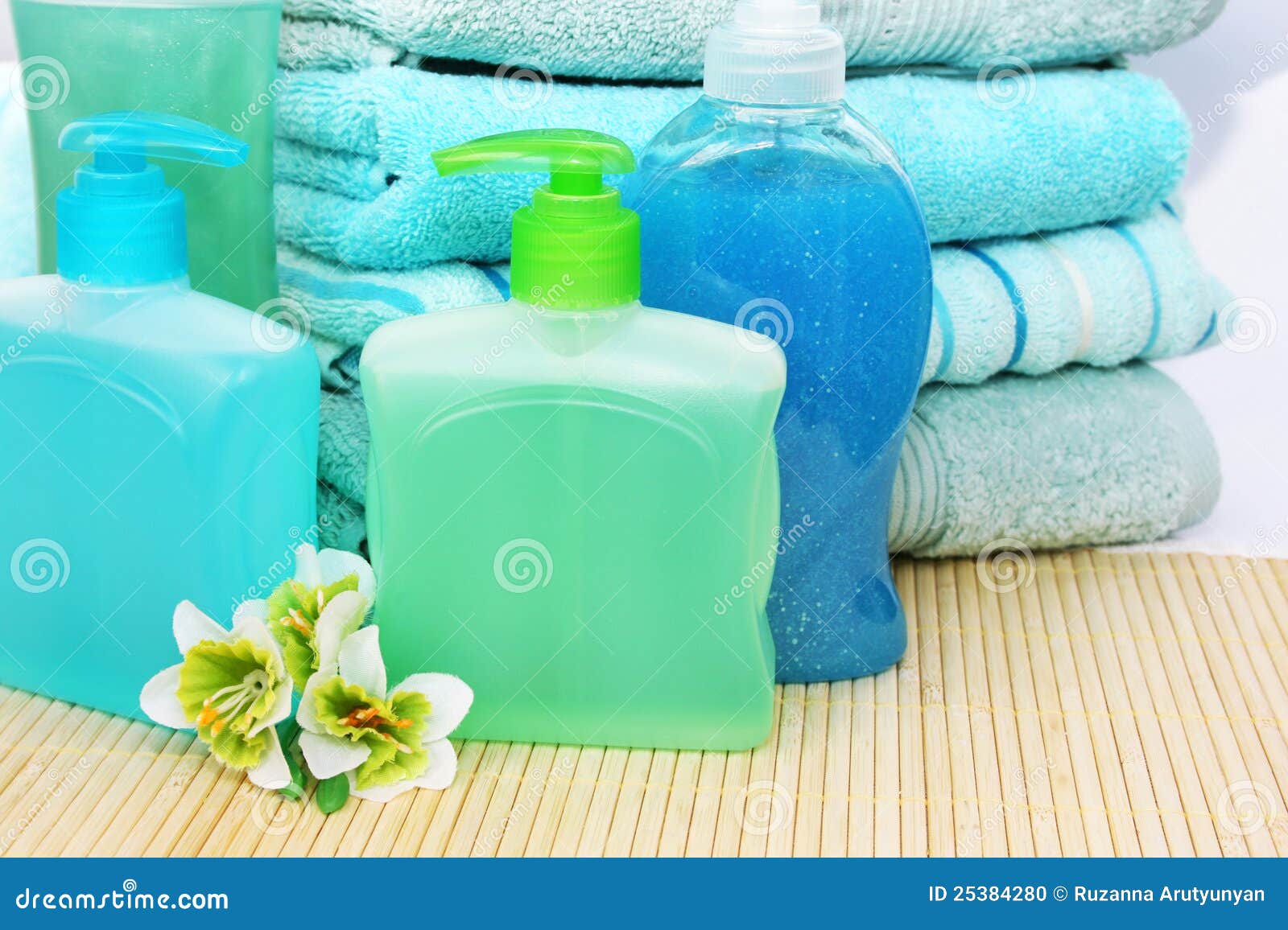 Towels, soaps and shampoo stock photo. Image of closeup 25384280