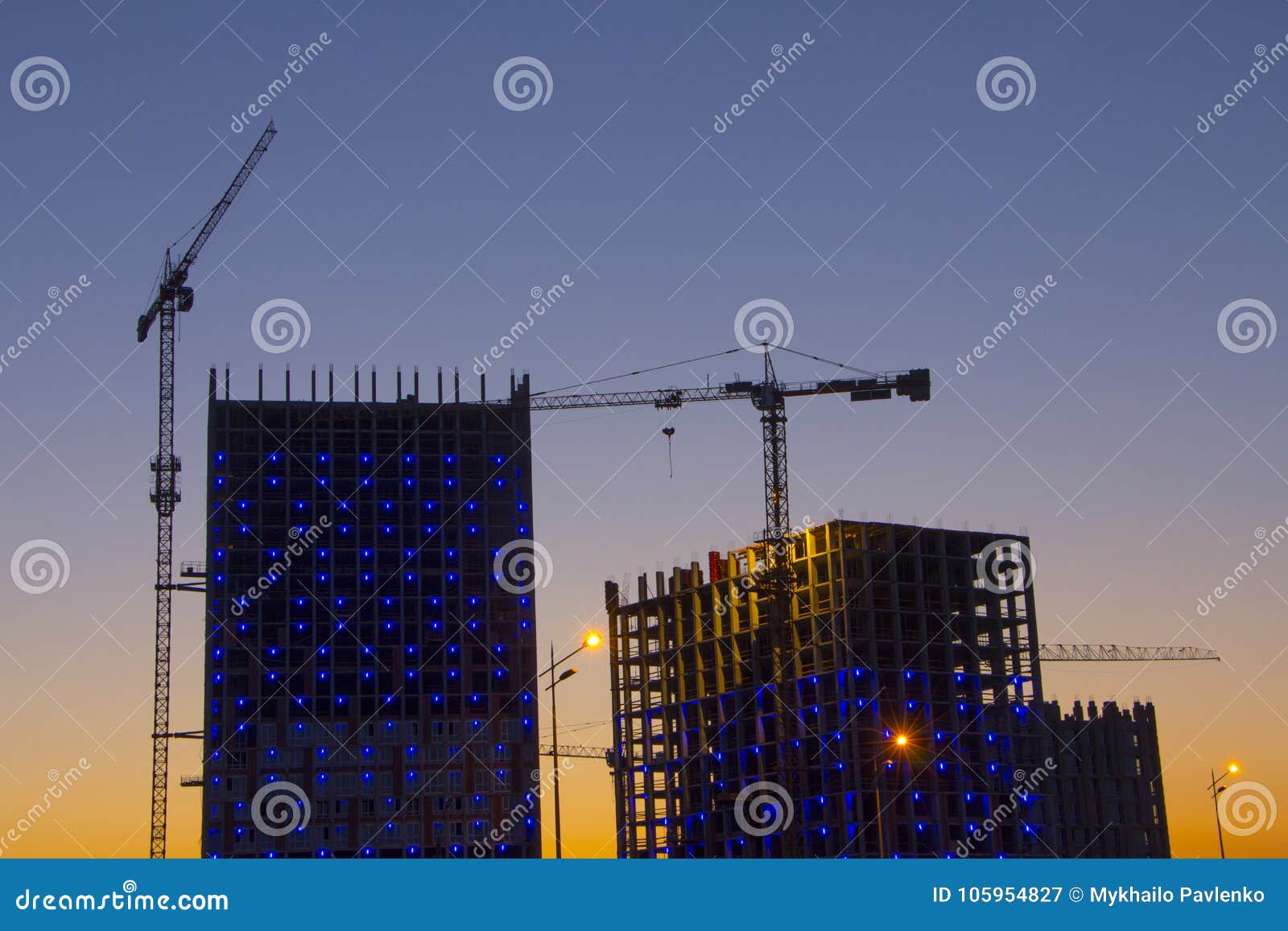 Tower Crane Against the Blue Sky, the Process of Building a Multi