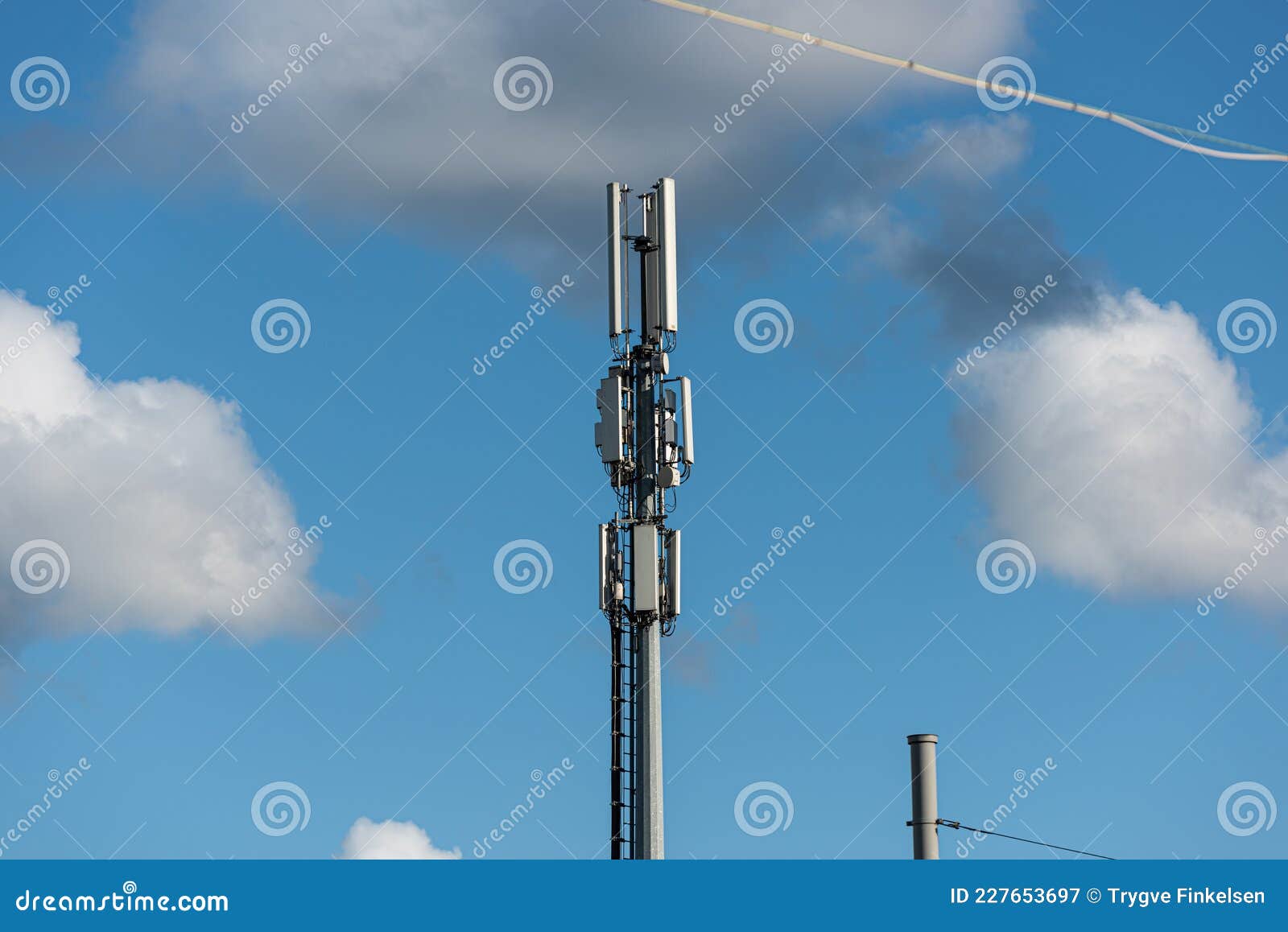 Tower with Different Types of Cellphone Transmitters and Antennas Stock