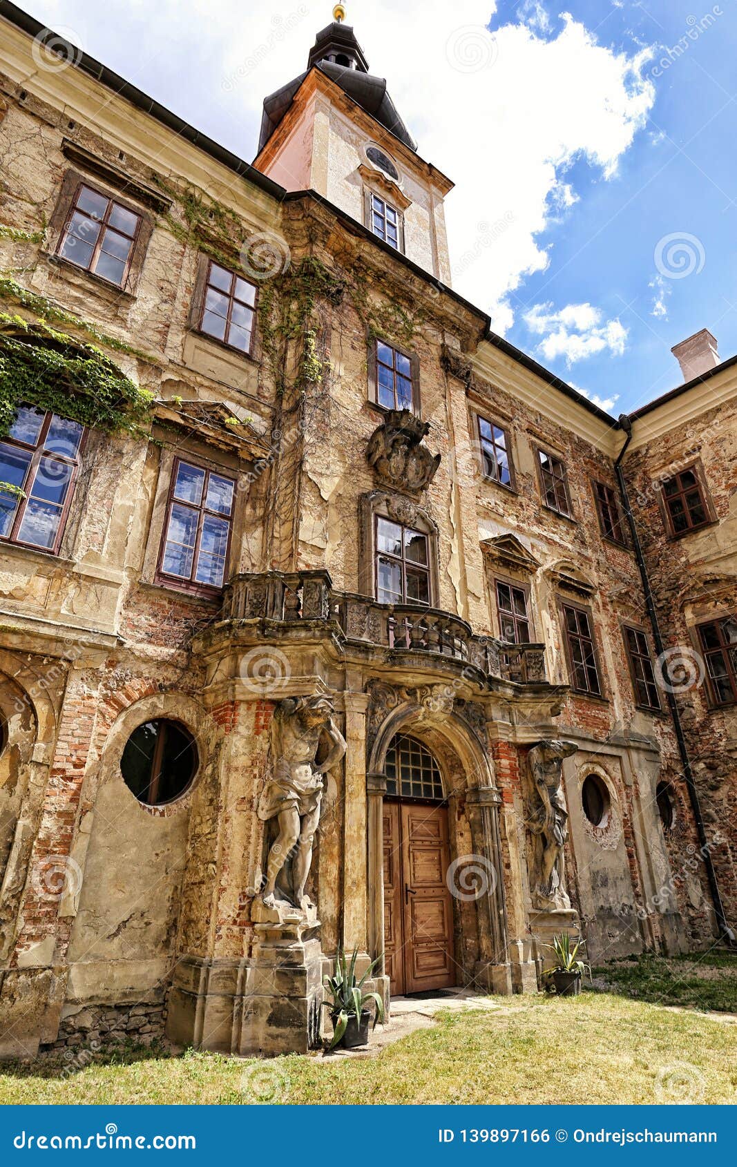 tower of old broken castle jezeri with scupltures