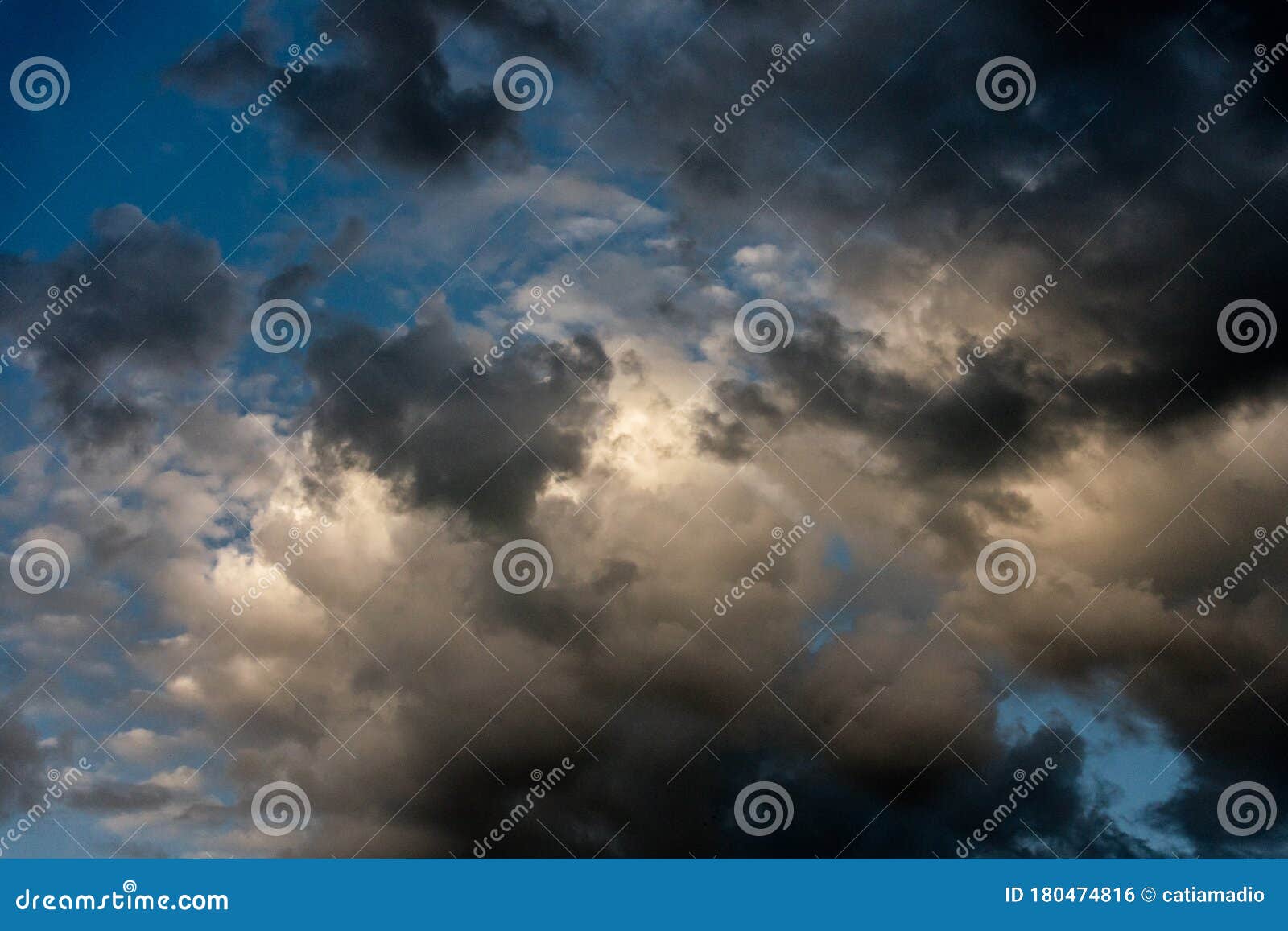 towering clouds with lights and shadows