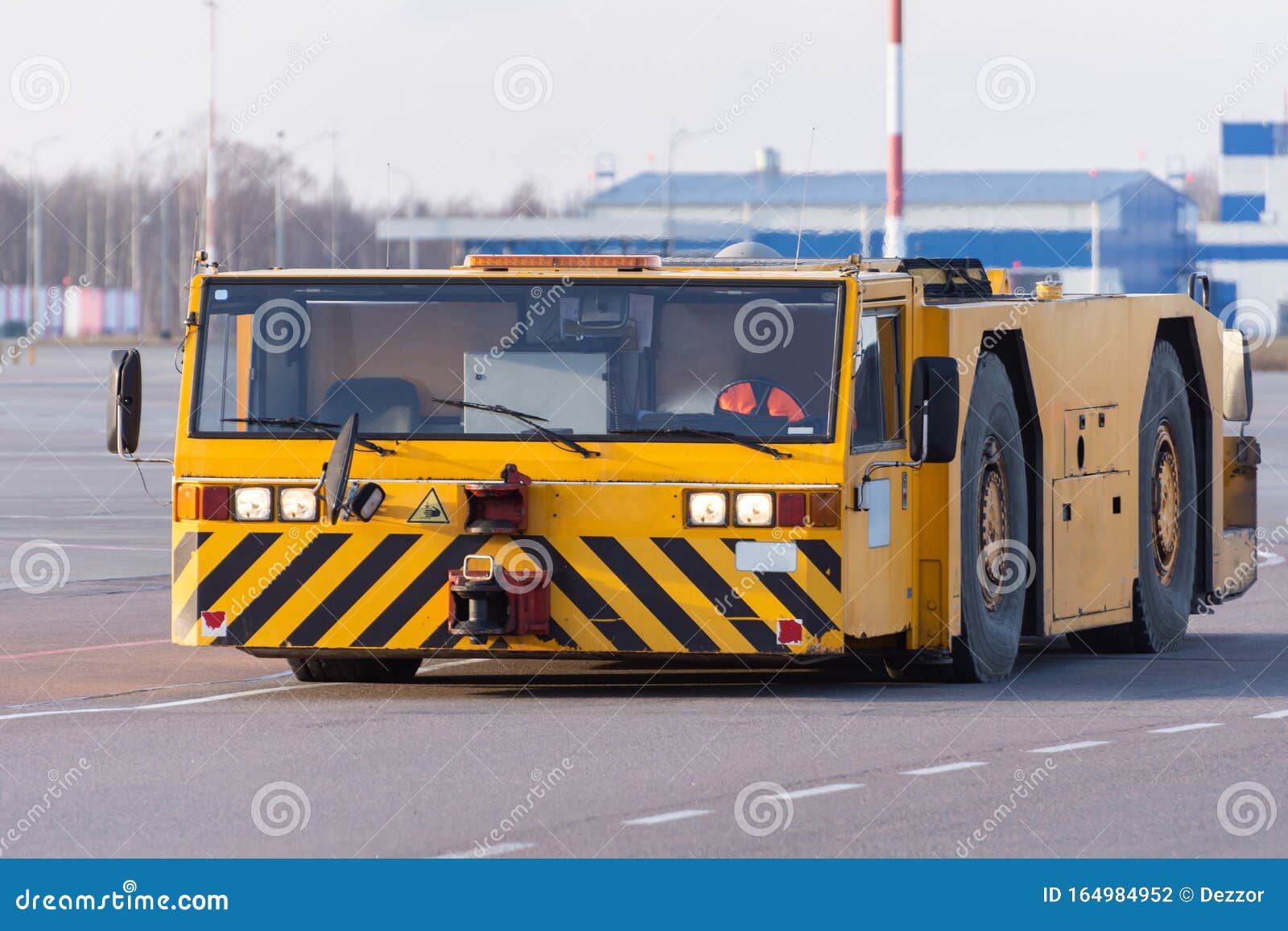 Towing Vehicles Rides on the Apron of the Airport Stock Photo Image