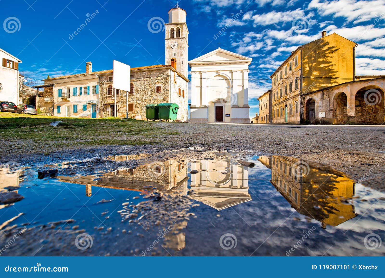 town of vizinada old cobbled square water reflection view