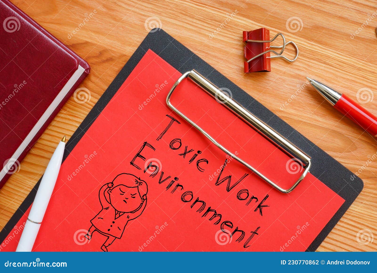 toxic work environment is shown on the business photo using the text
