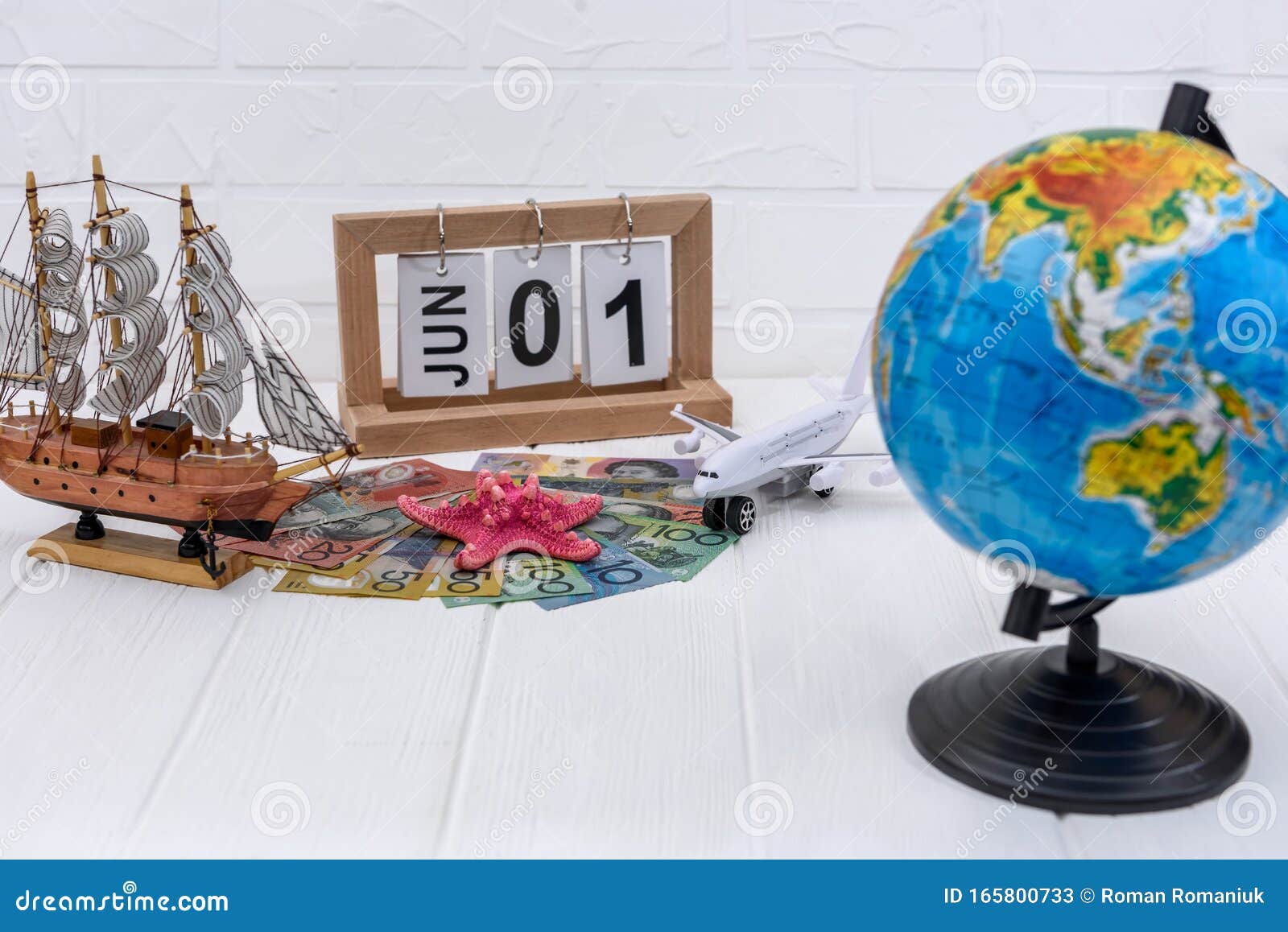 Toy Airplane with Globe and Australian Dollar Banknotes Stock Image