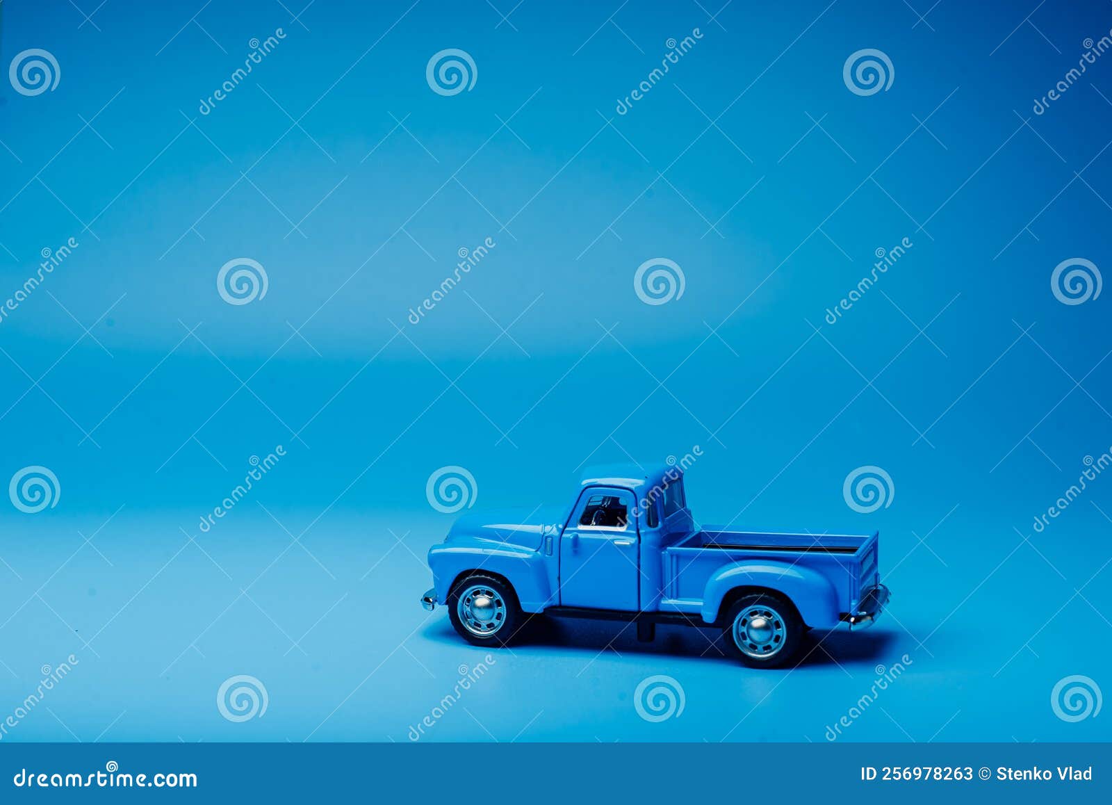 Toy Blue Pickup Truck on a Blue Background Stock Image Image of data