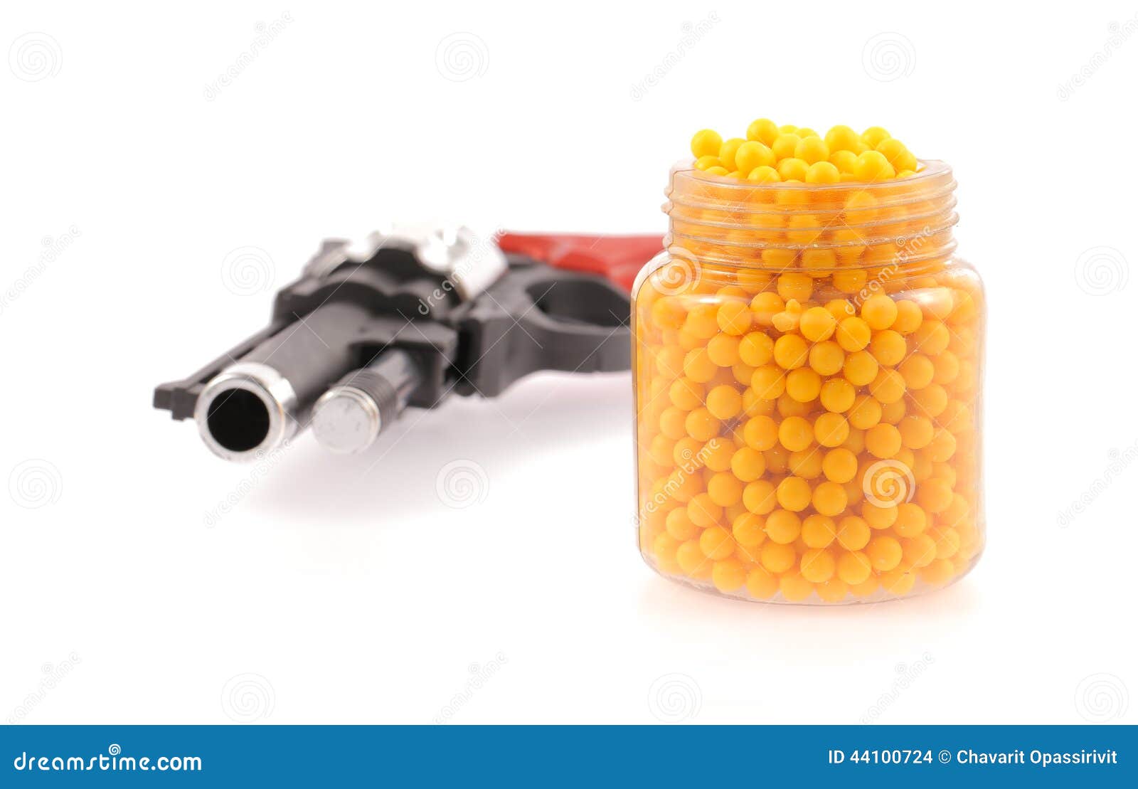 A Toy Gun and Plastic Bottles Filled with Bead Stock Photo Image of