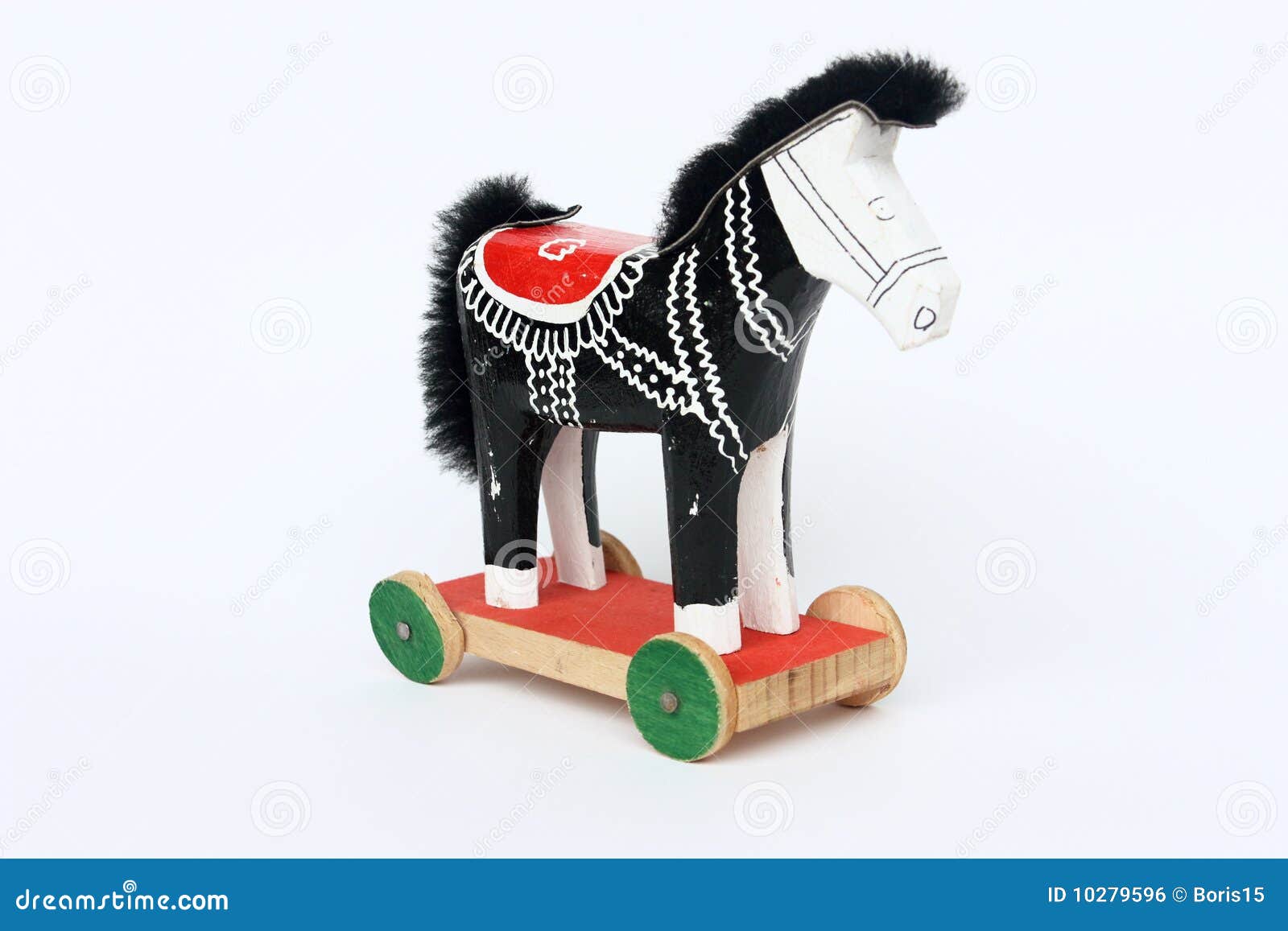 Toy horse on the wheels stock photo. Image of saddle 10279596