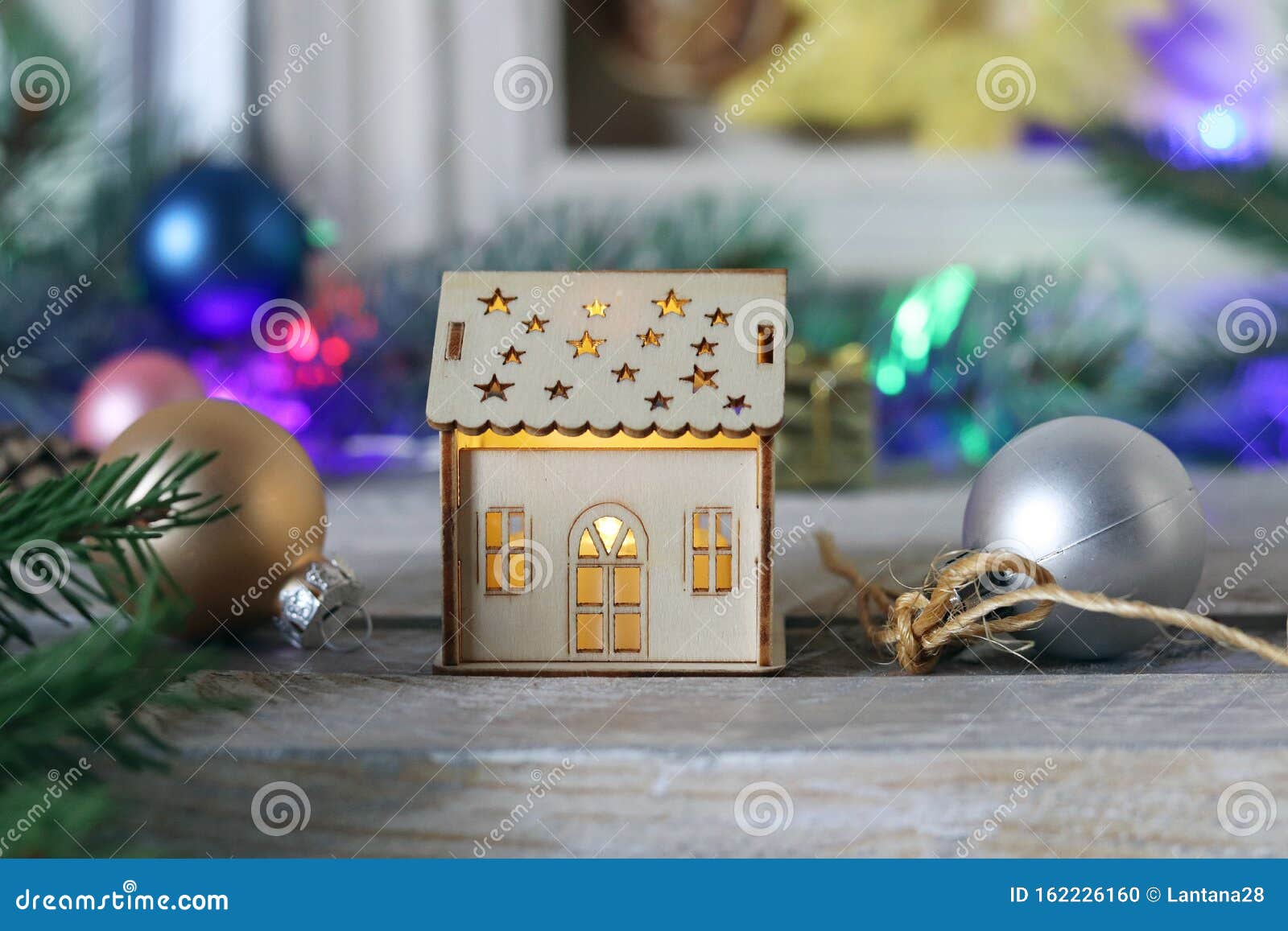 Toy House with Illuminations on the Background of Christmas Decor Stock ...