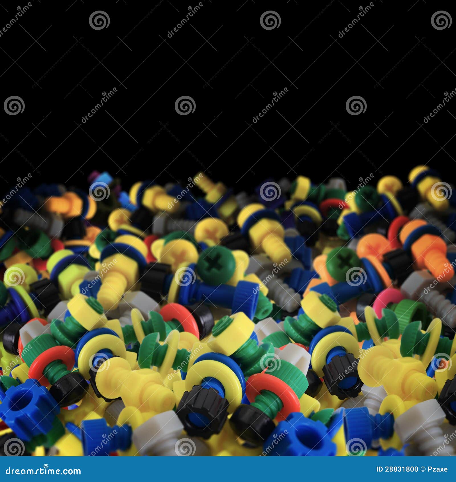 Toy plastic bolts and nuts stock photo. Image of black 28831800