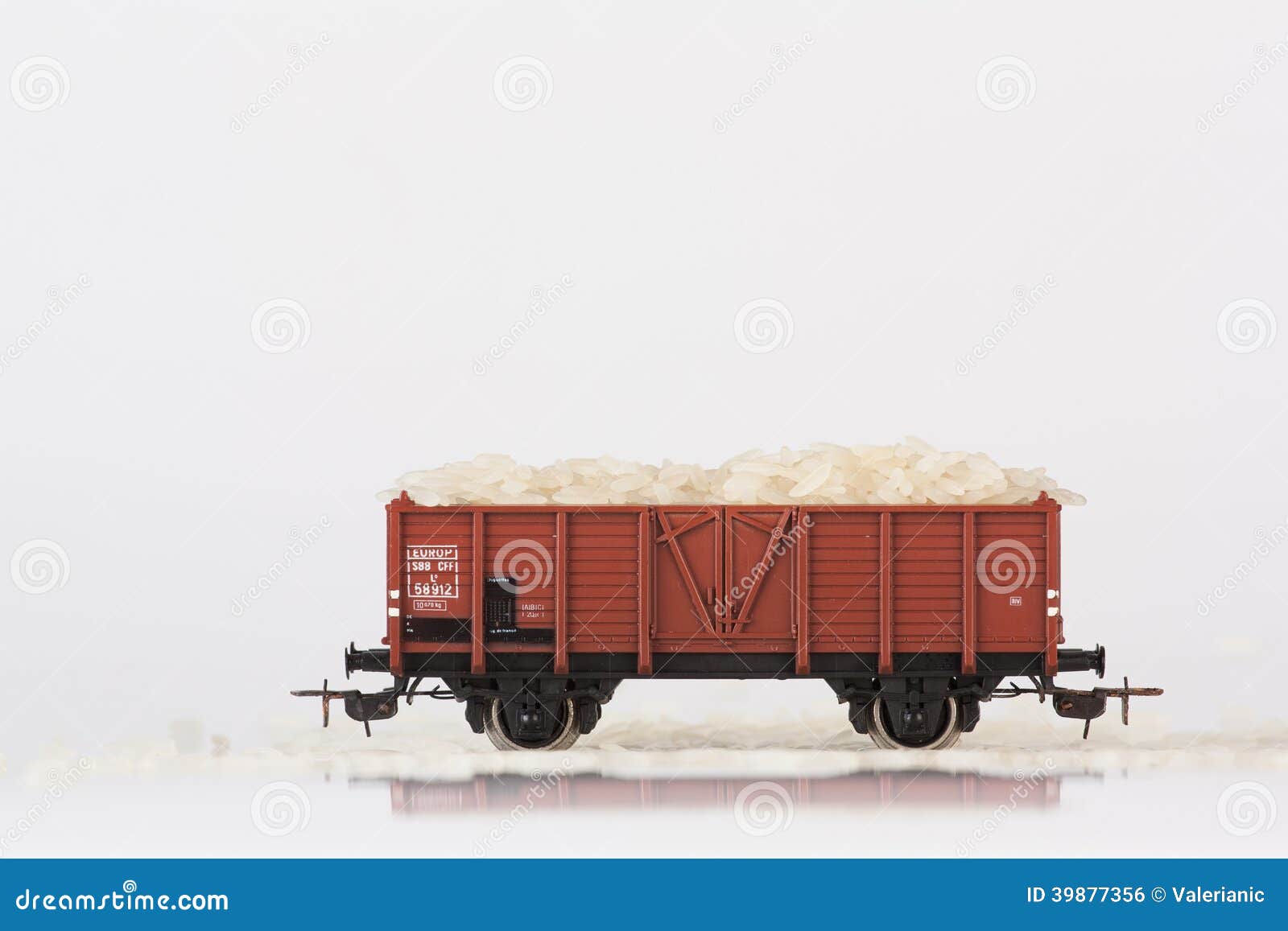 Toy rail car with rice stock photo. Image of railway 39877356