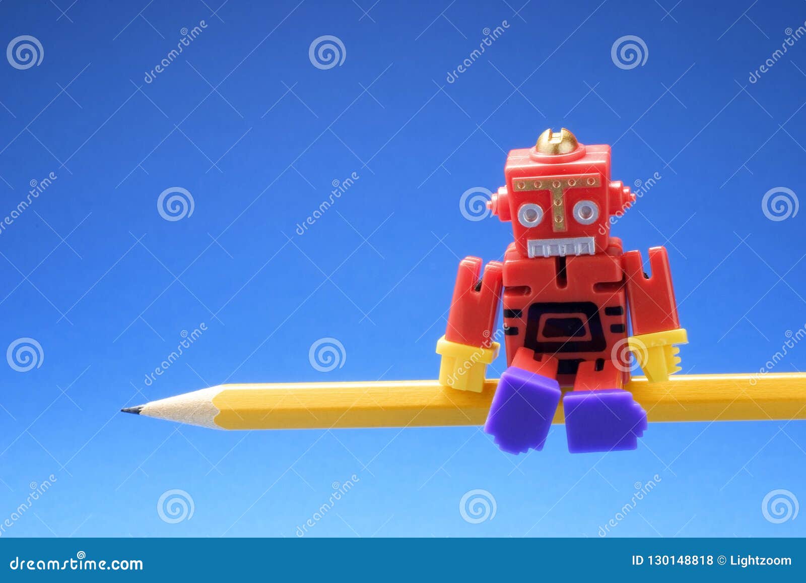 Toy Robot on Pencil stock photo. Image of graphite, robot 130148818