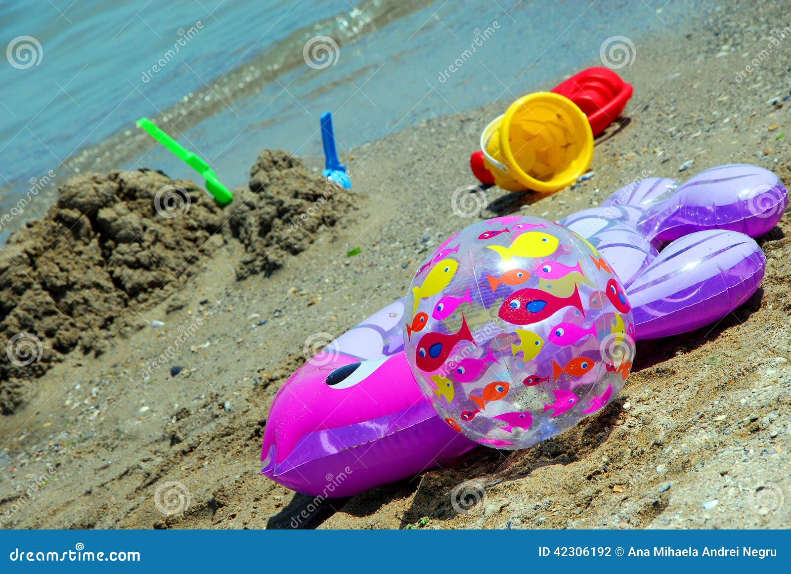 Toys on the beach stock photo. Image of concept, love 42306192
