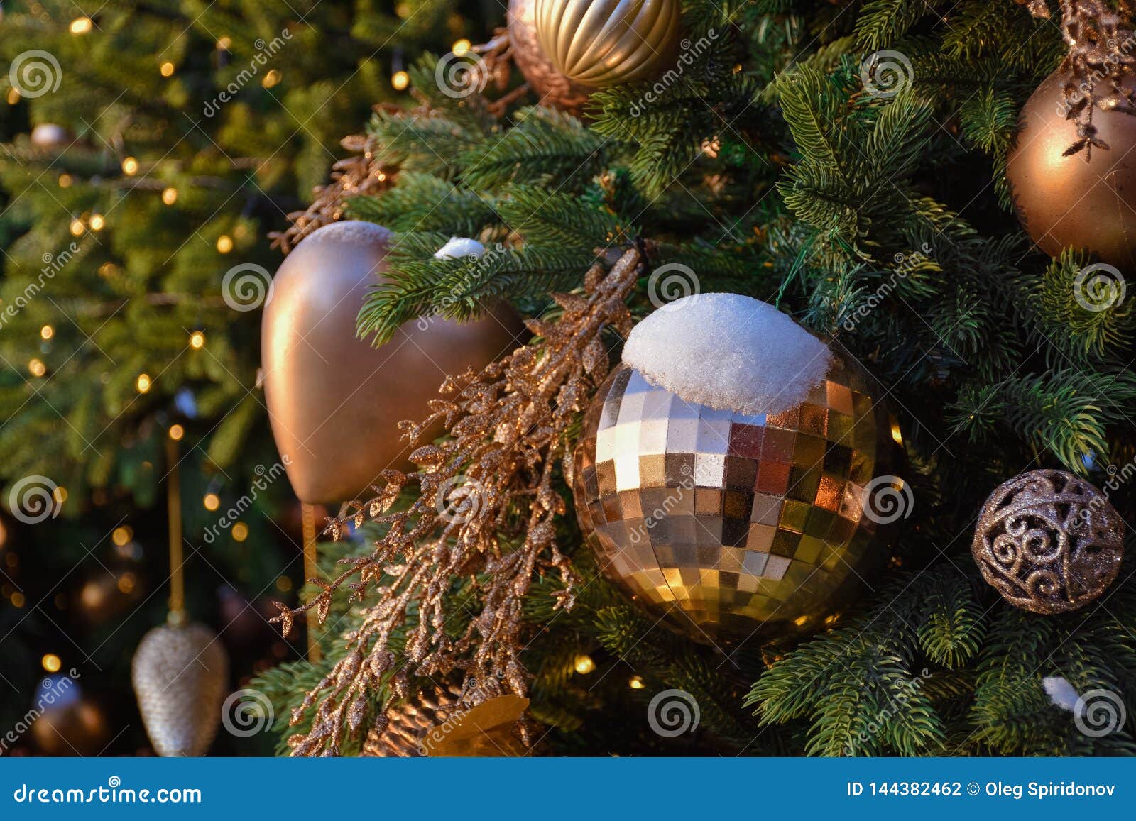 Toys on a Christmas Tree in the Snow Stock Photo - Image of bronze ...