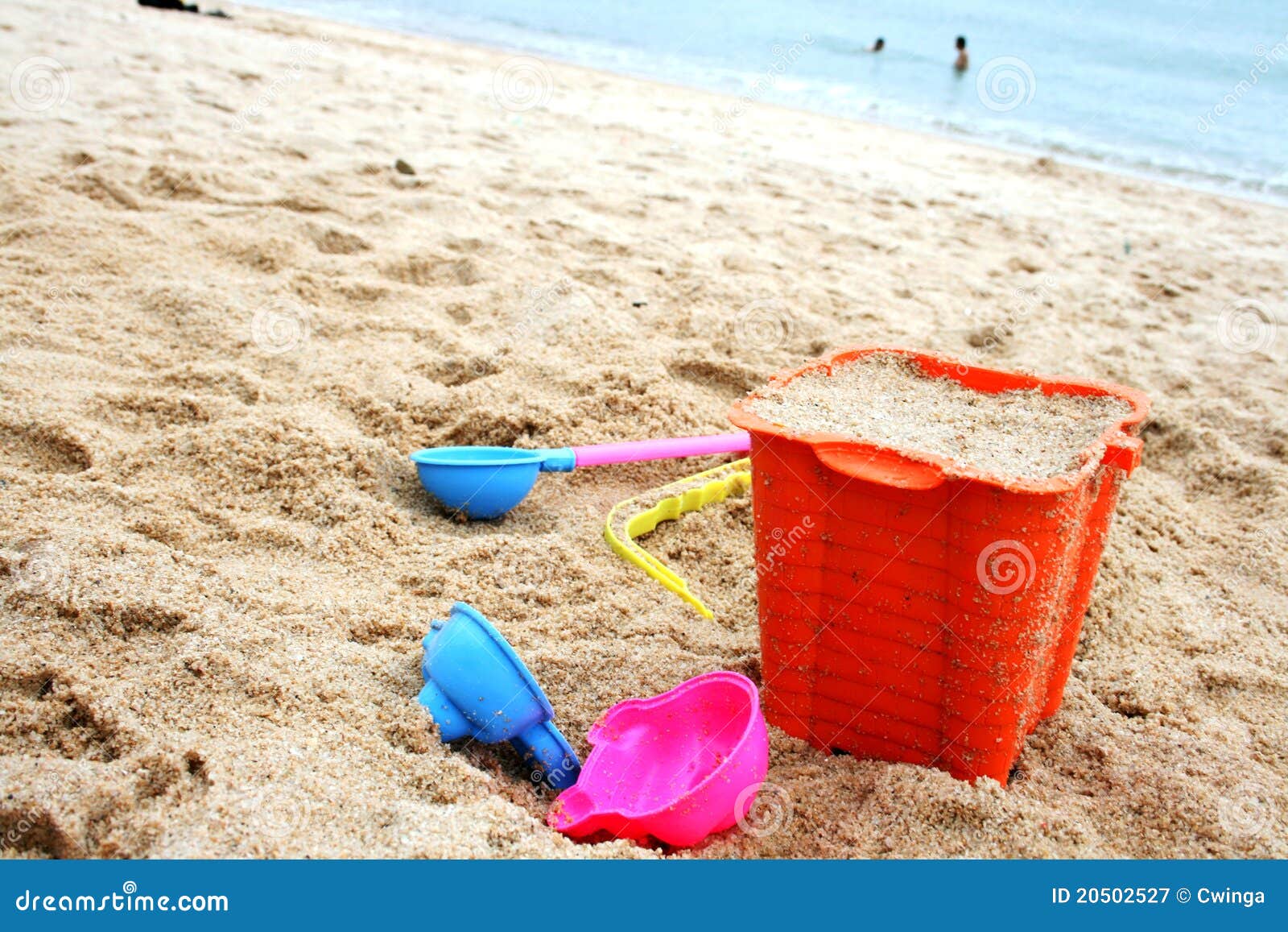 Toys on sand stock image. Image of sand, kids, pink, child - 20502527